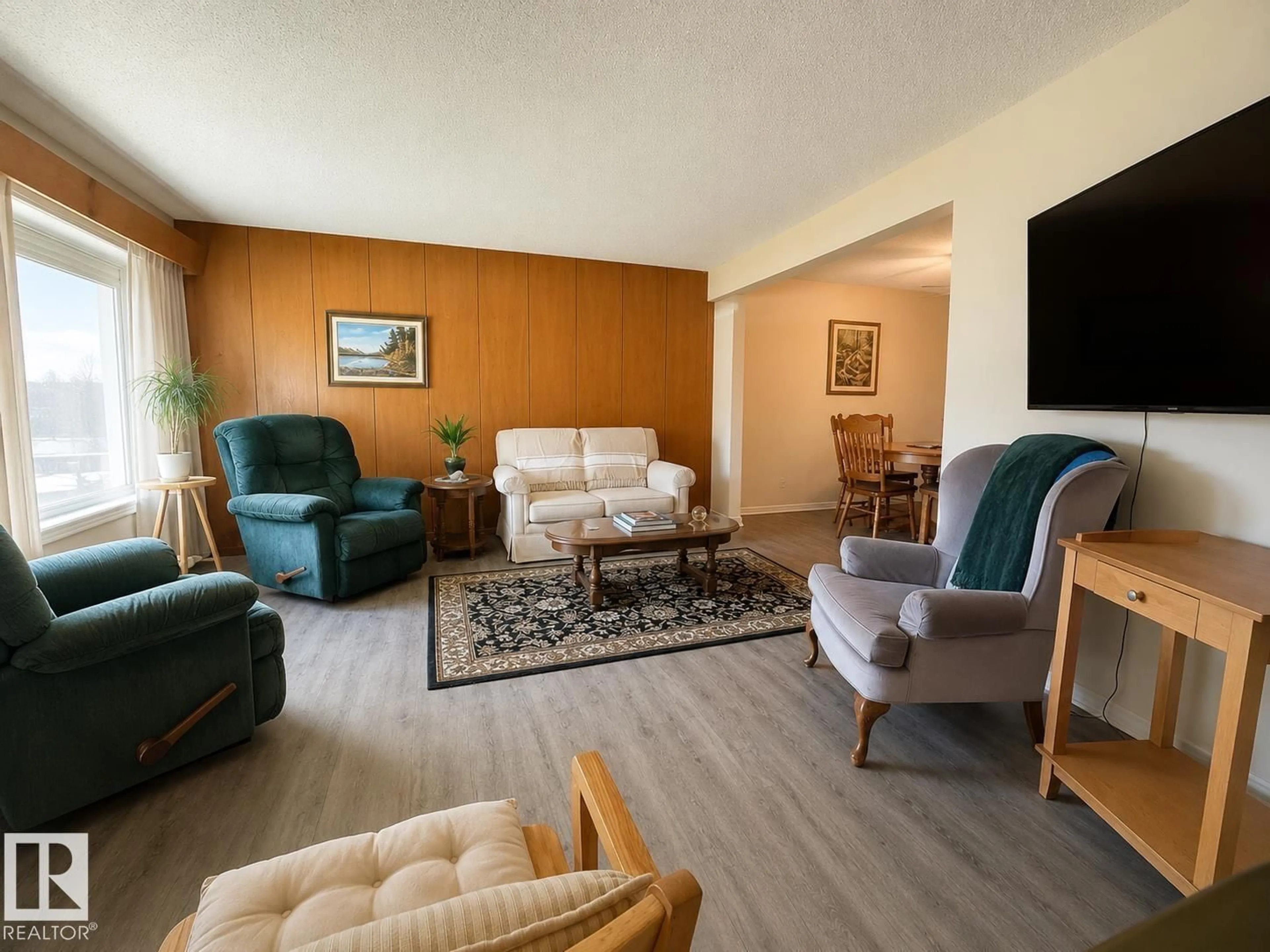 Living room with furniture, unknown for 5712 101 AV, Edmonton Alberta T6A0G8
