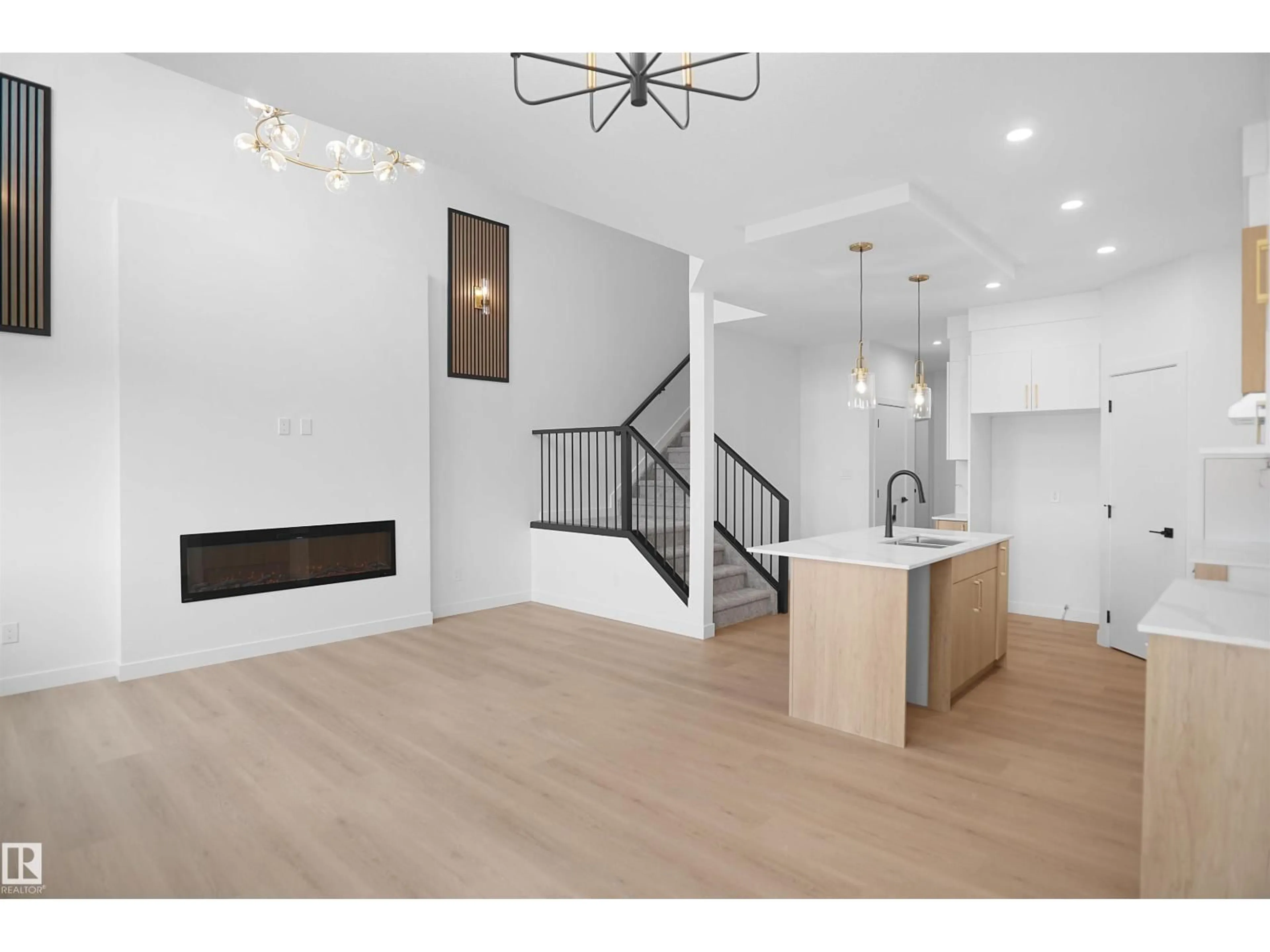 Open concept kitchen, wood/laminate floor for 119 PEIRWYCK LO, Spruce Grove Alberta T7X4G2