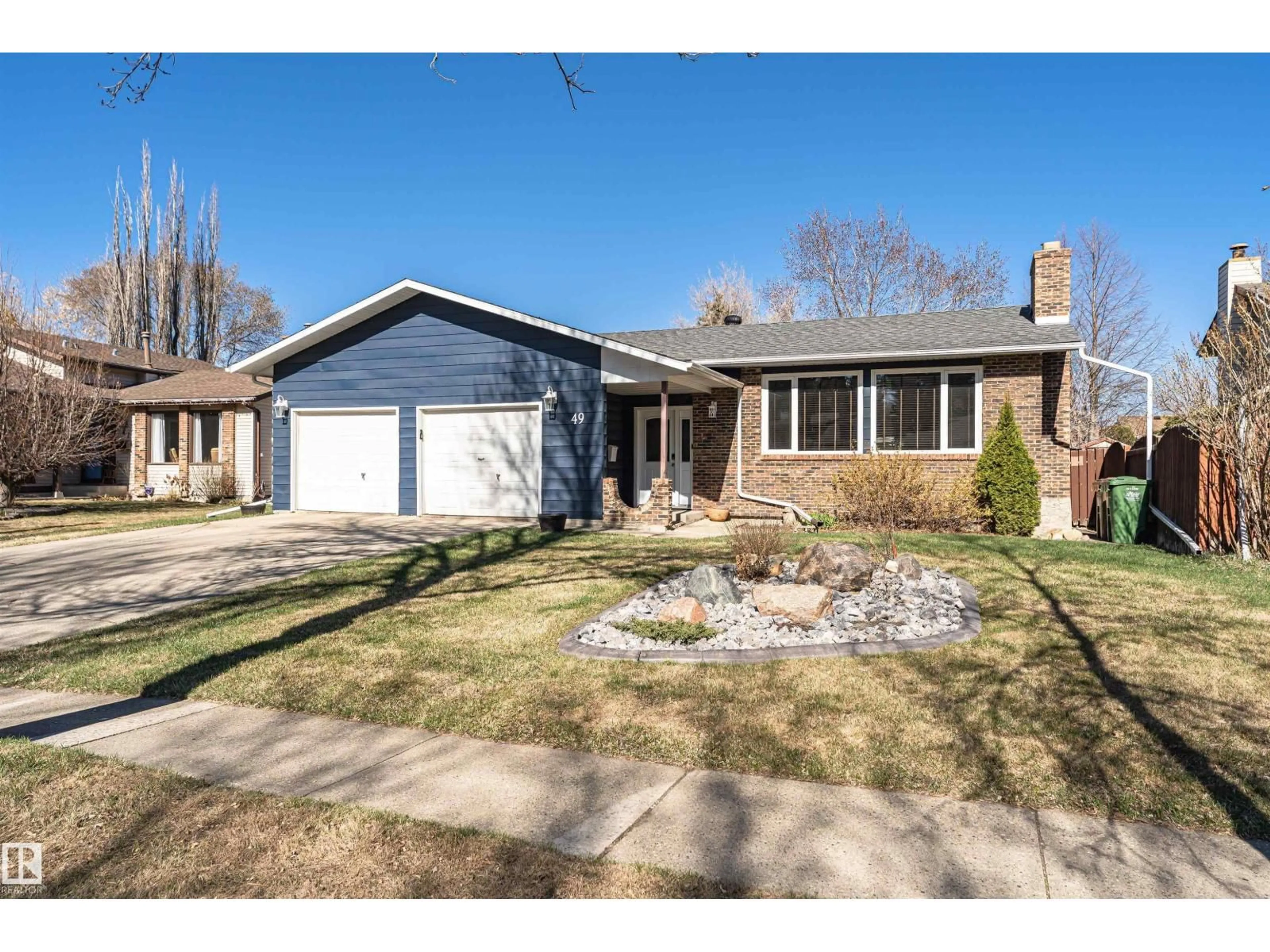 Home with brick exterior material, street for 49 ASH CR, St. Albert Alberta T8N3J6
