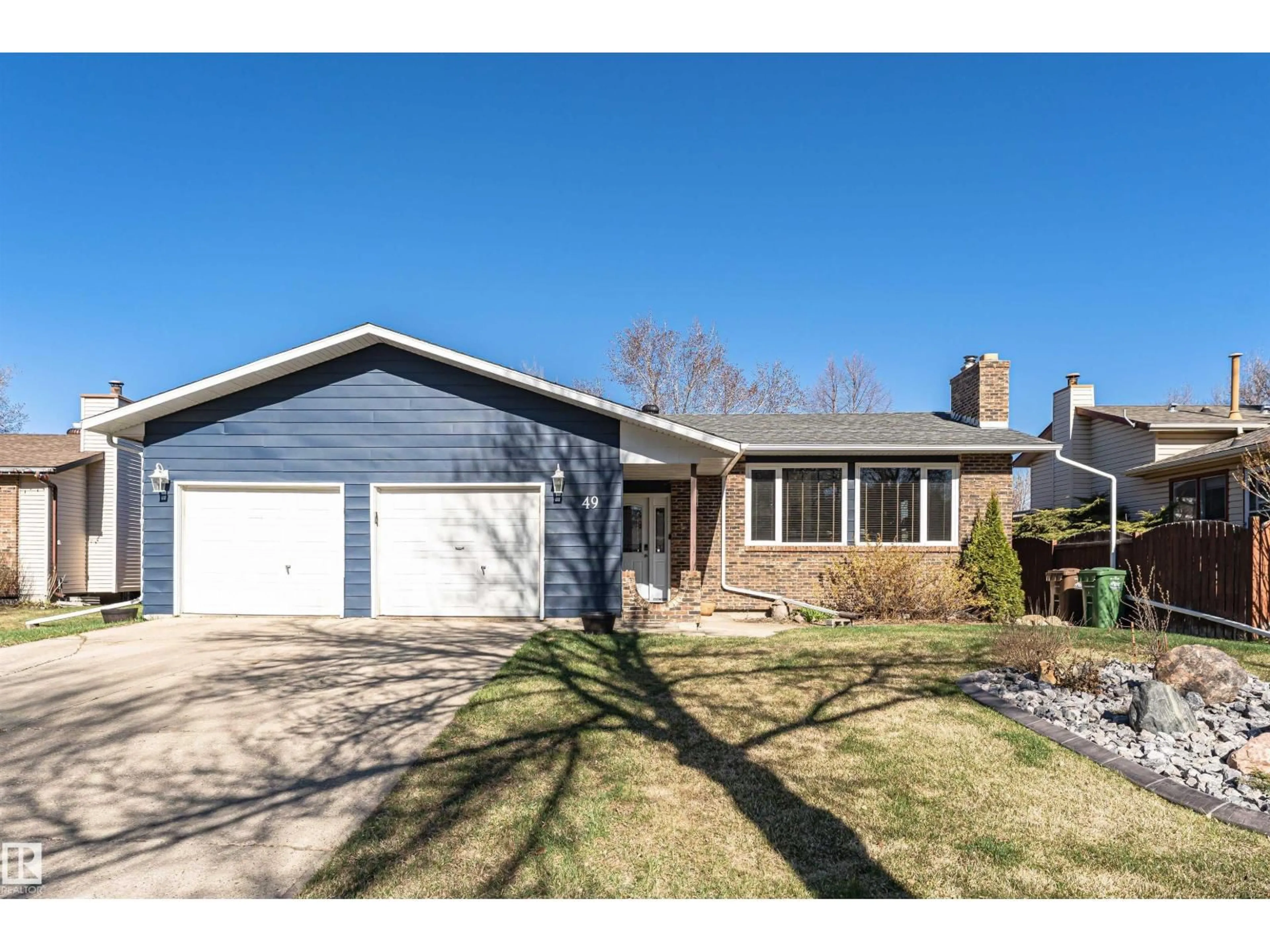 Home with vinyl exterior material, street for 49 ASH CR, St. Albert Alberta T8N3J6