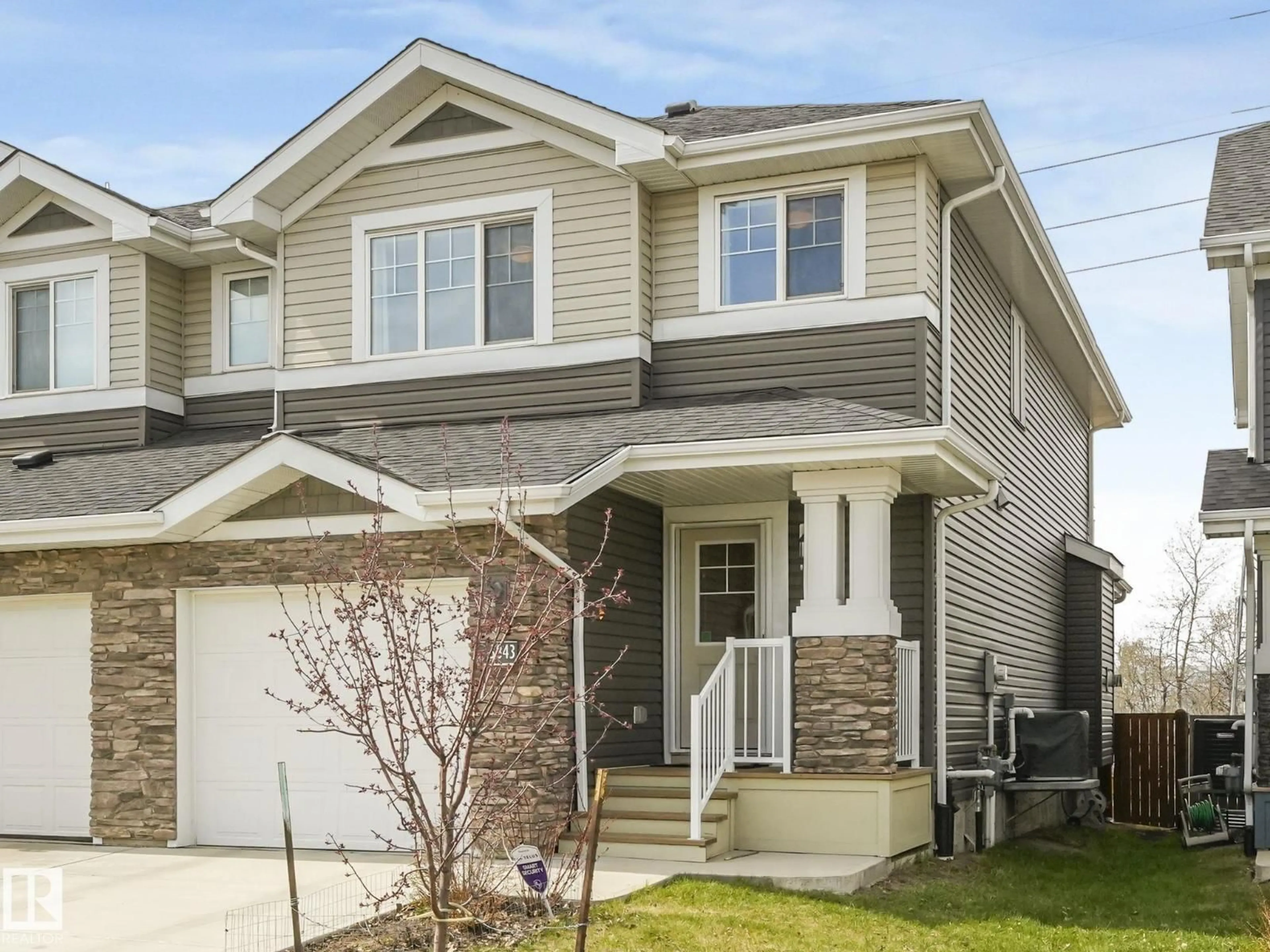 Home with vinyl exterior material, street for 3843 ROBINS CR, Edmonton Alberta T5S0M7