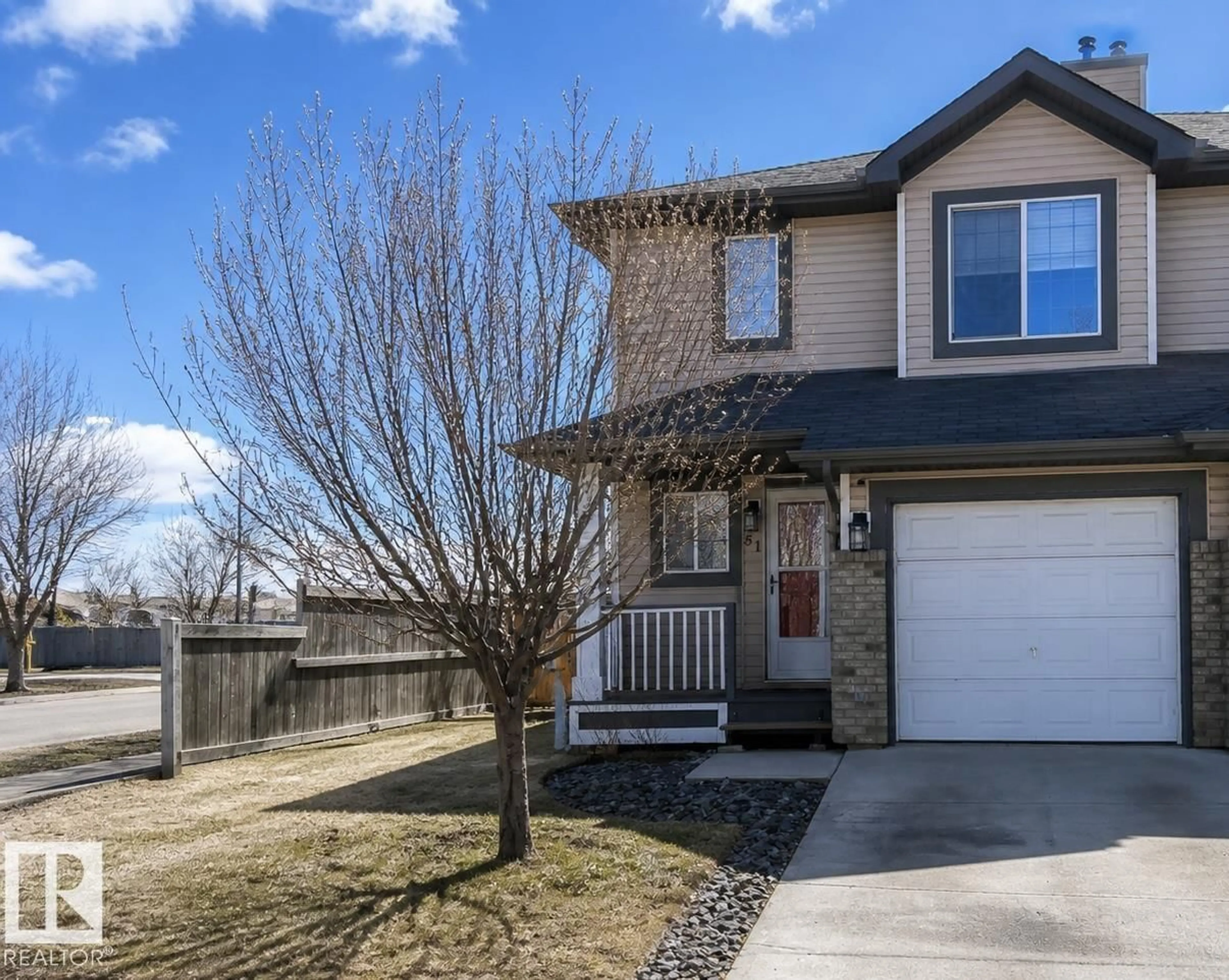 Home with vinyl exterior material, street for 51 GALLOWAY WD, Fort Saskatchewan Alberta T8L0A3