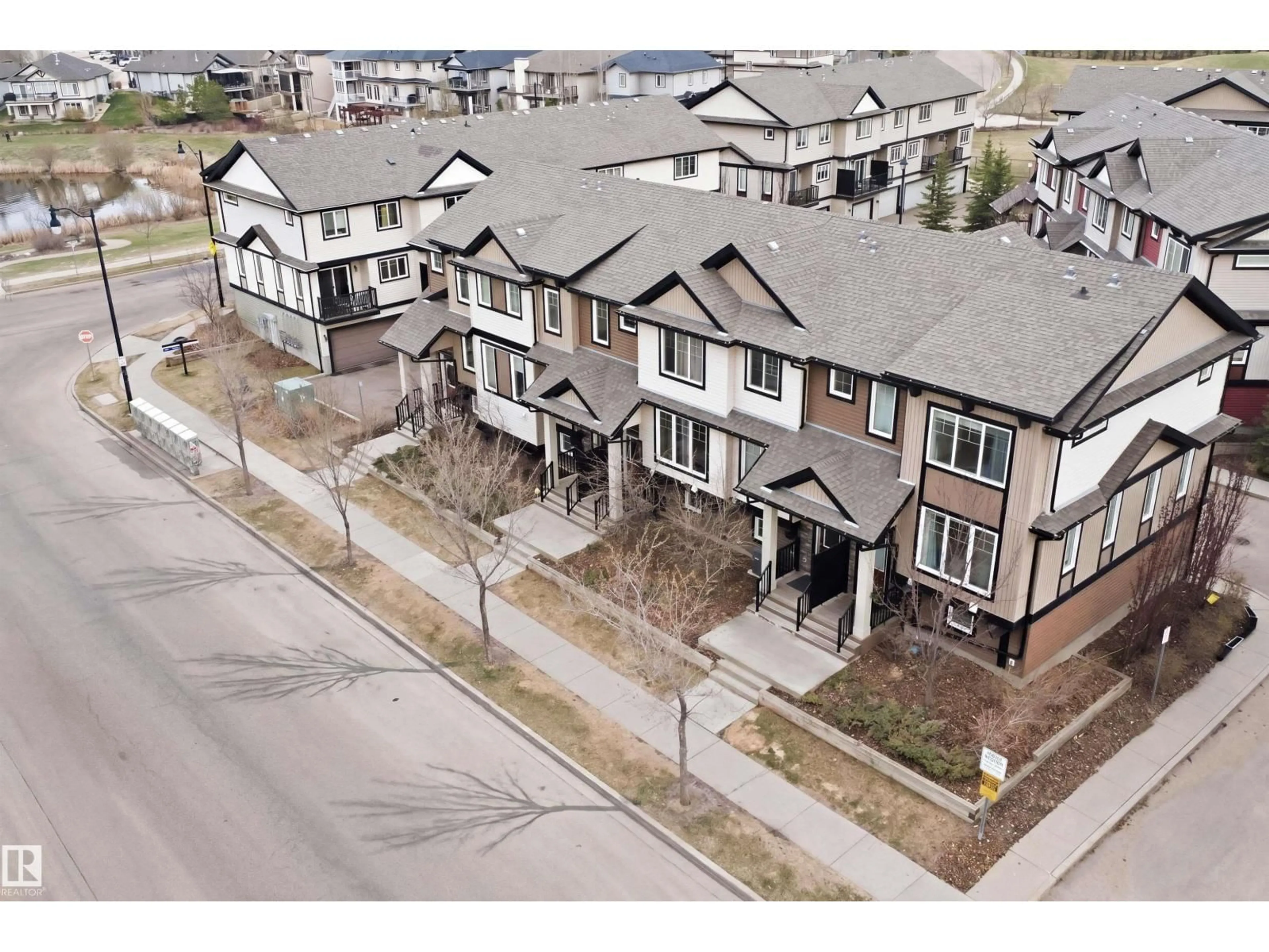 A pic from outside/outdoor area/front of a property/back of a property/a pic from drone, street for 1780 CUNNINGHAM WY, Edmonton Alberta T6W2J5