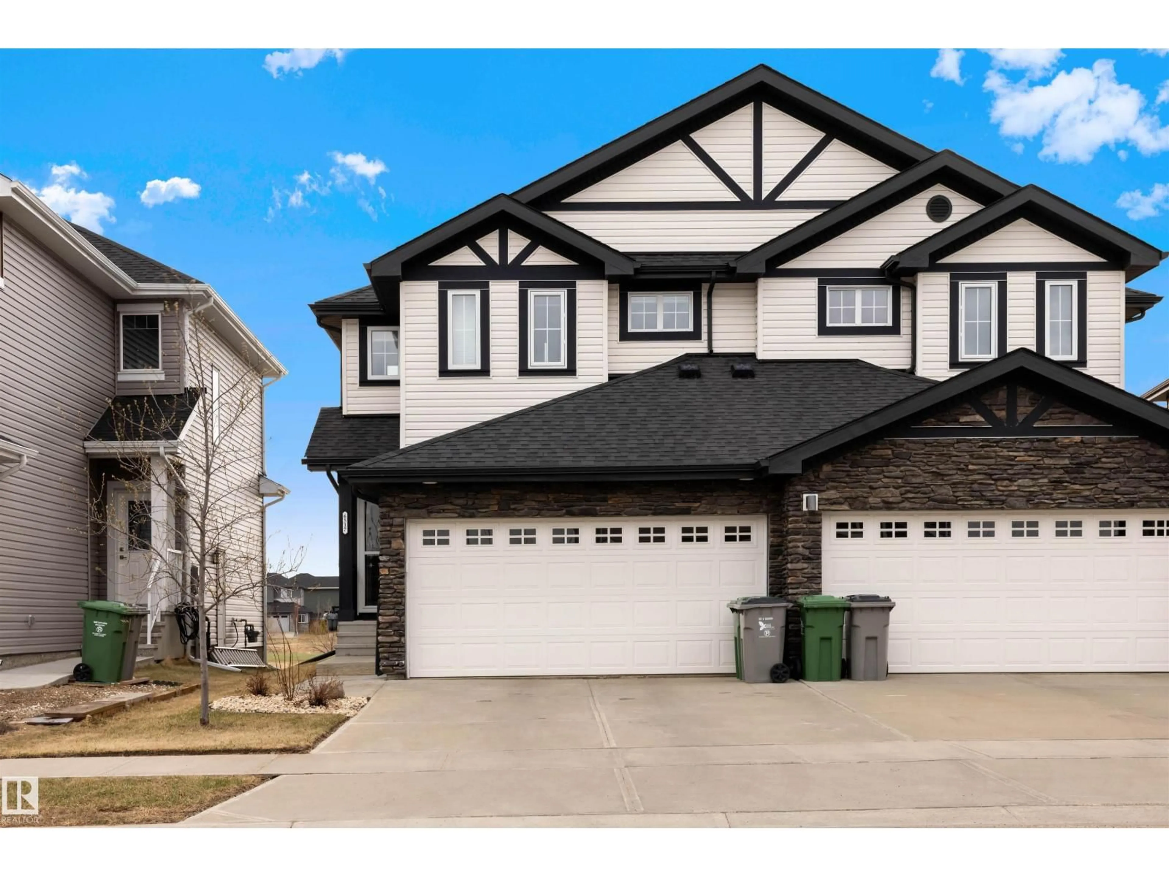 Home with vinyl exterior material, street for 6517 57 AV, Beaumont Alberta T4X2A4