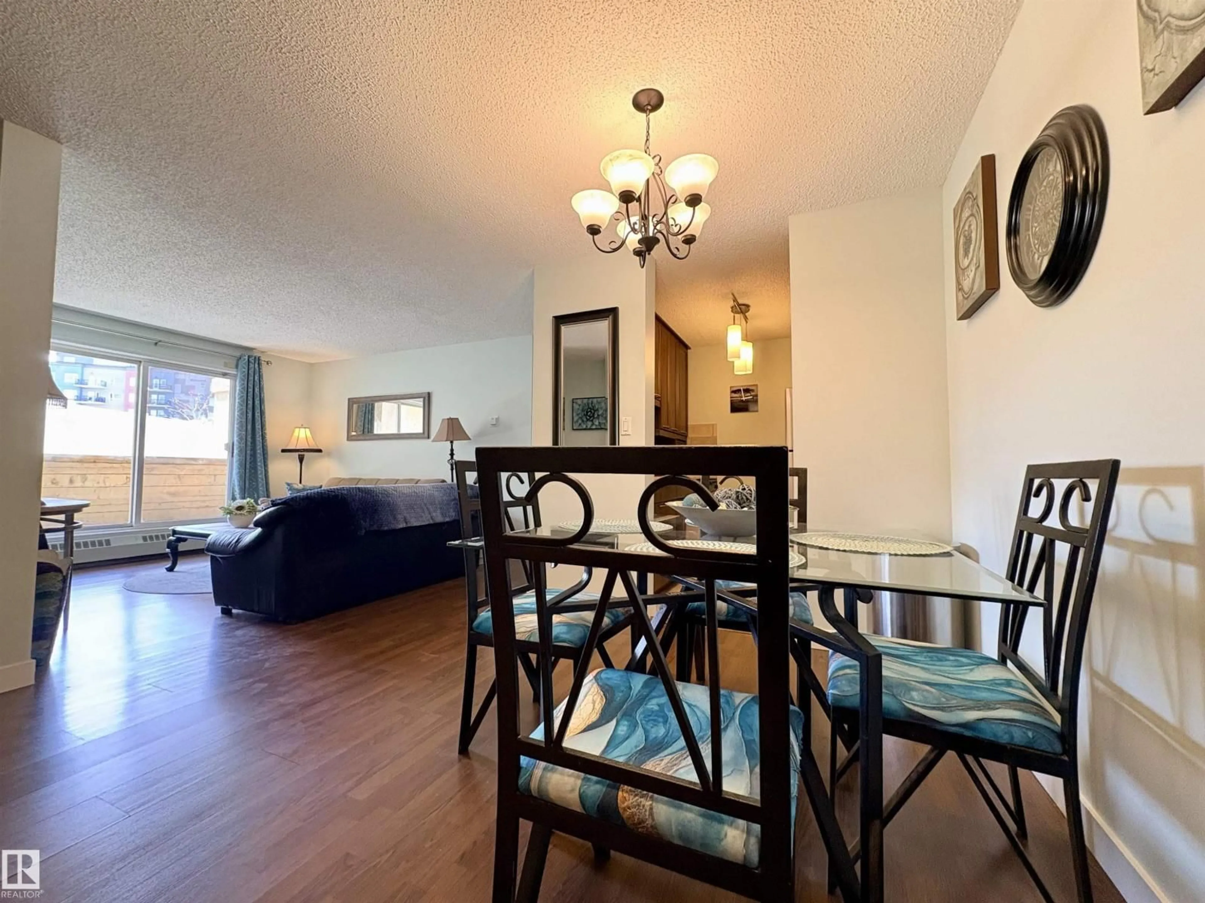 Dining room, wood/laminate floor for 163 10520 120 ST NW, Edmonton Alberta T5H4L9