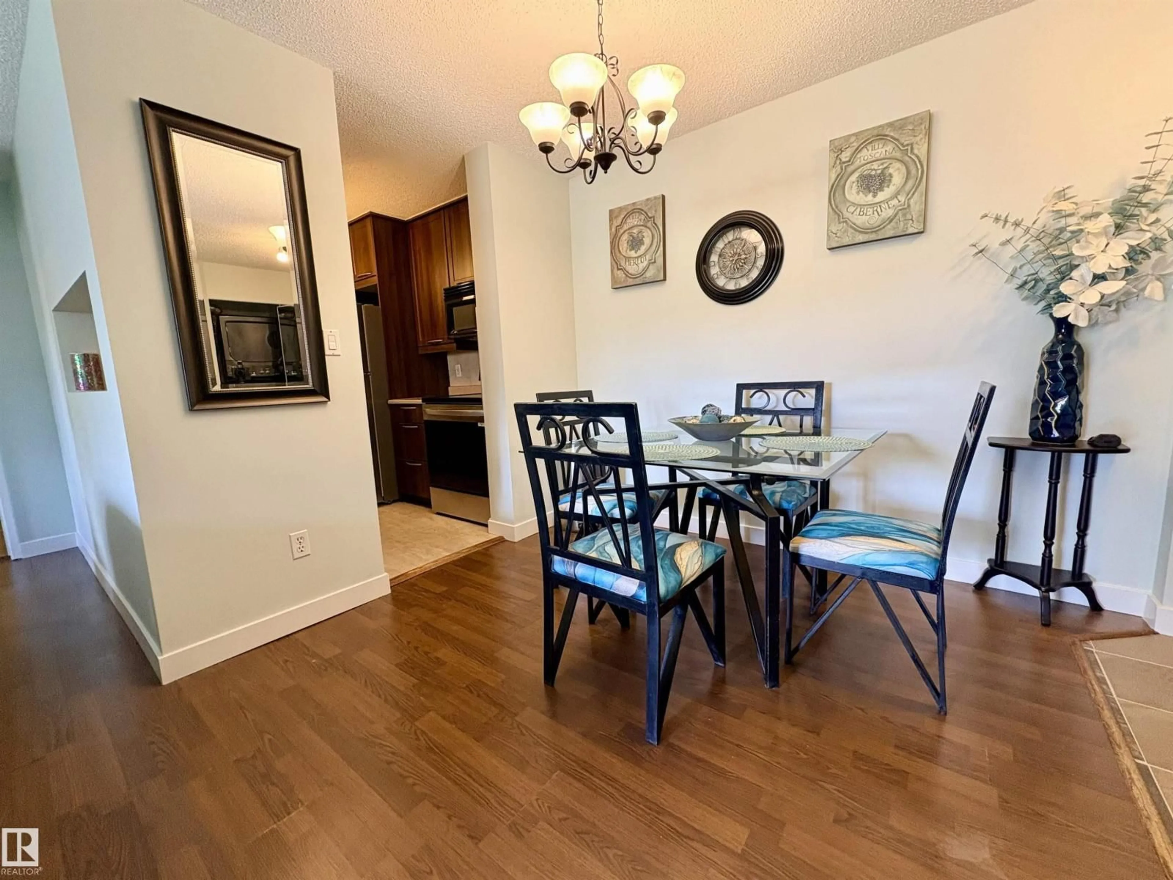 Dining room, wood/laminate floor for 163 10520 120 ST NW, Edmonton Alberta T5H4L9