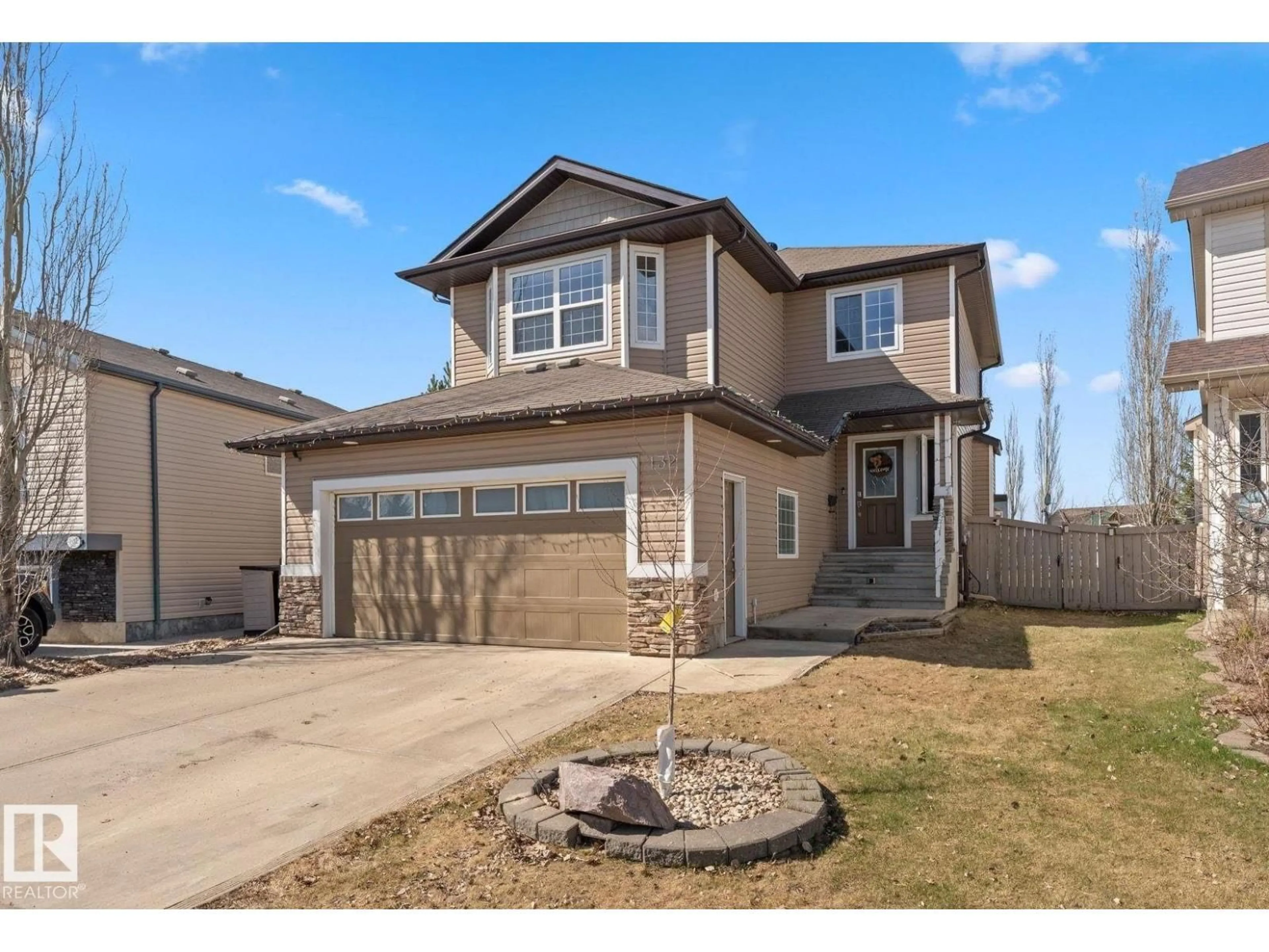 Home with vinyl exterior material, street for 132 SELKIRK PL, Leduc Alberta T9E0L6