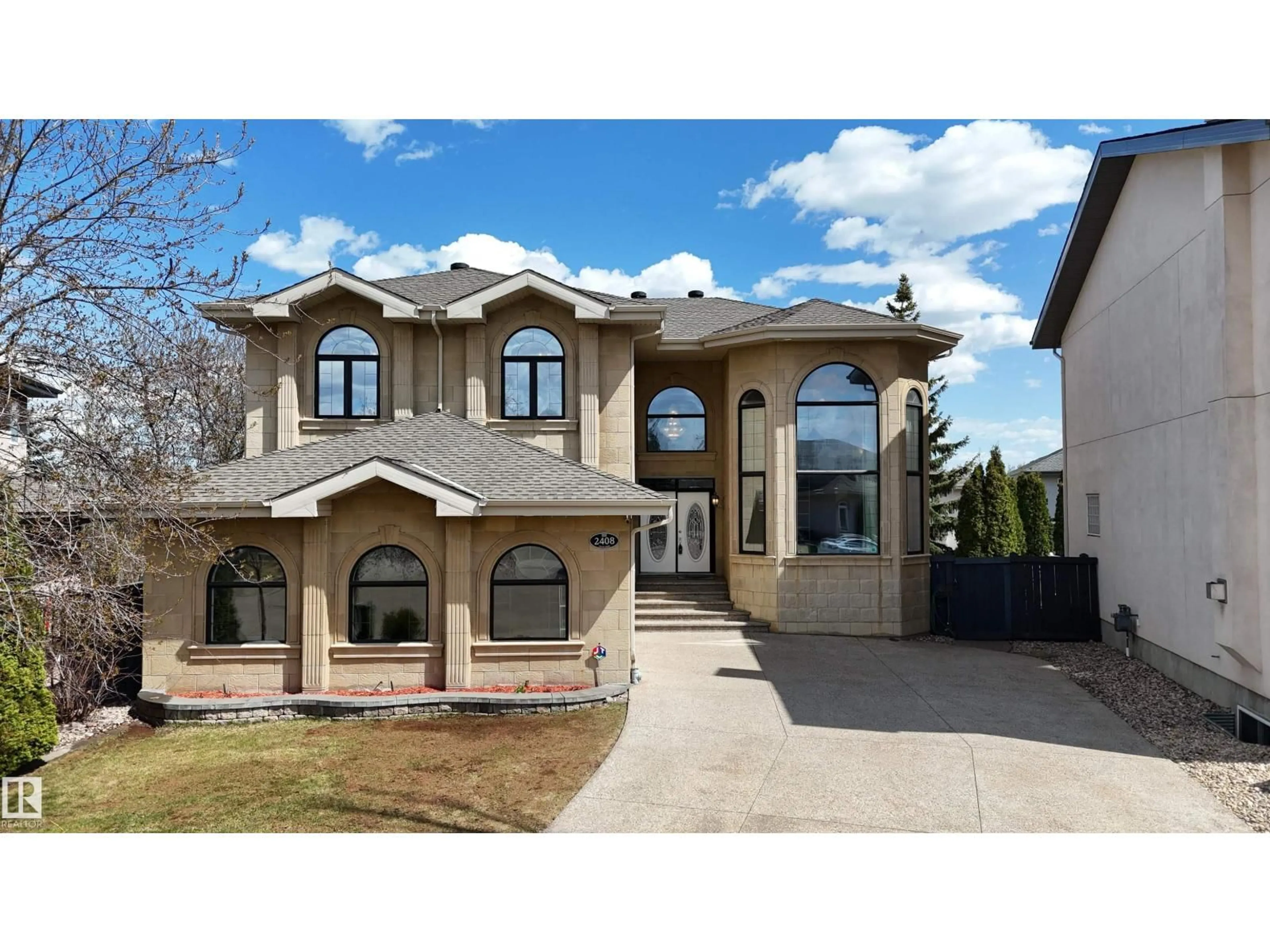 Home with vinyl exterior material, street for NW - 2408 TEGLER GR, Edmonton Alberta T6R3K2