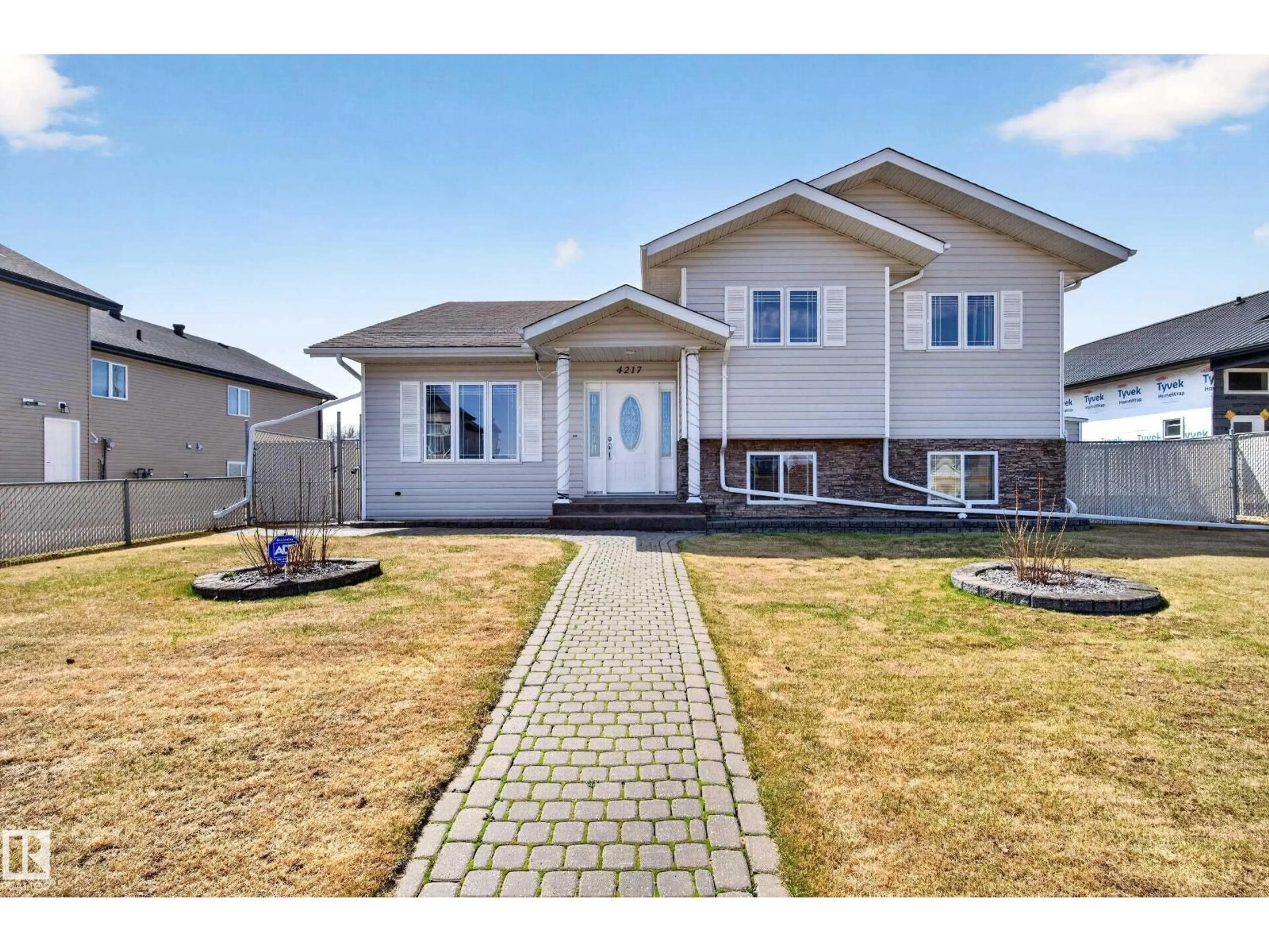 Home with vinyl exterior material, street for 4217 55 AV, Lamont Alberta T0B2R0