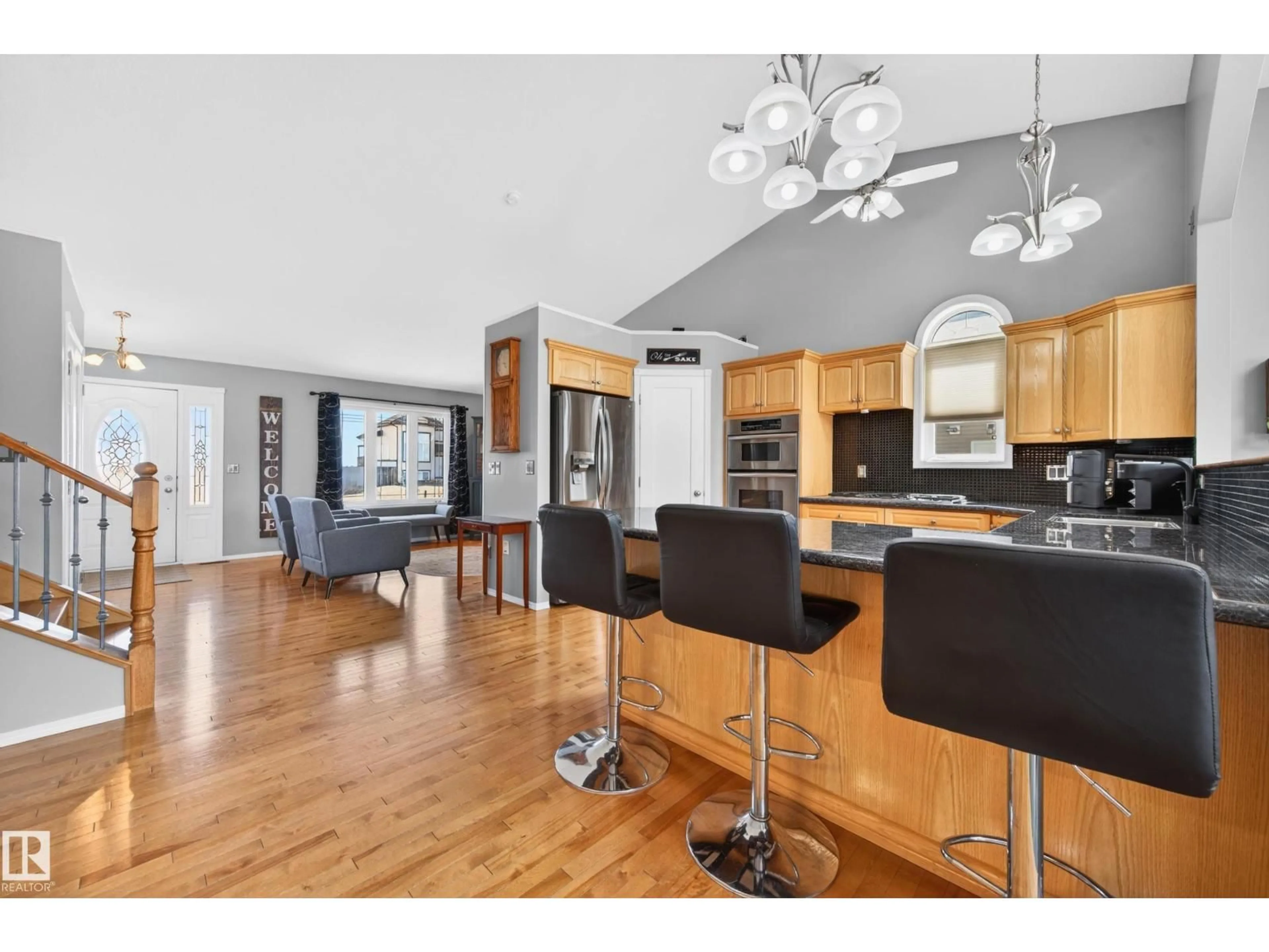 Open concept kitchen, wood/laminate floor for 4217 55 AV, Lamont Alberta T0B2R0