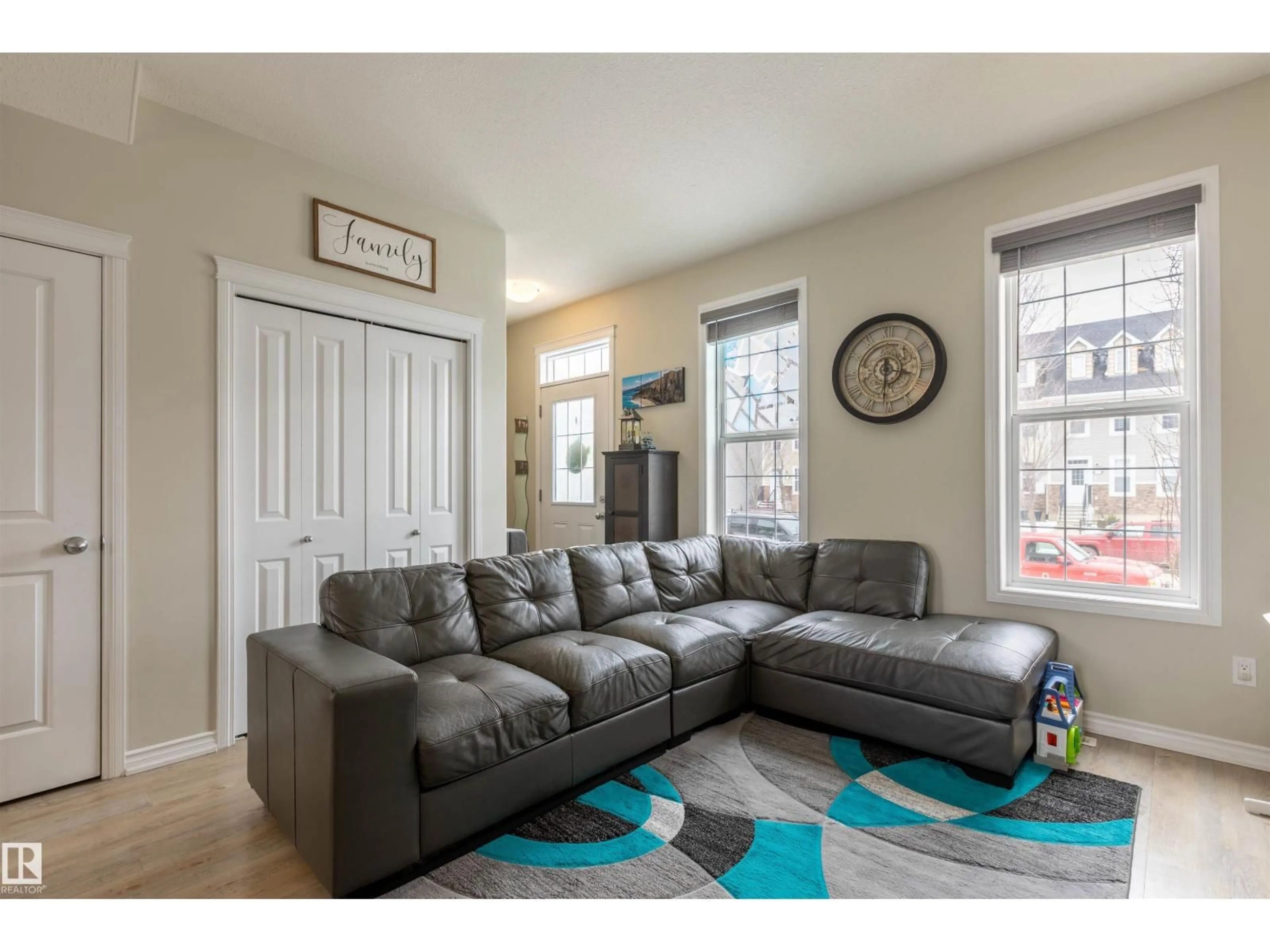 Living room with furniture, unknown for 9832 105 AV, Morinville Alberta T8R0C1