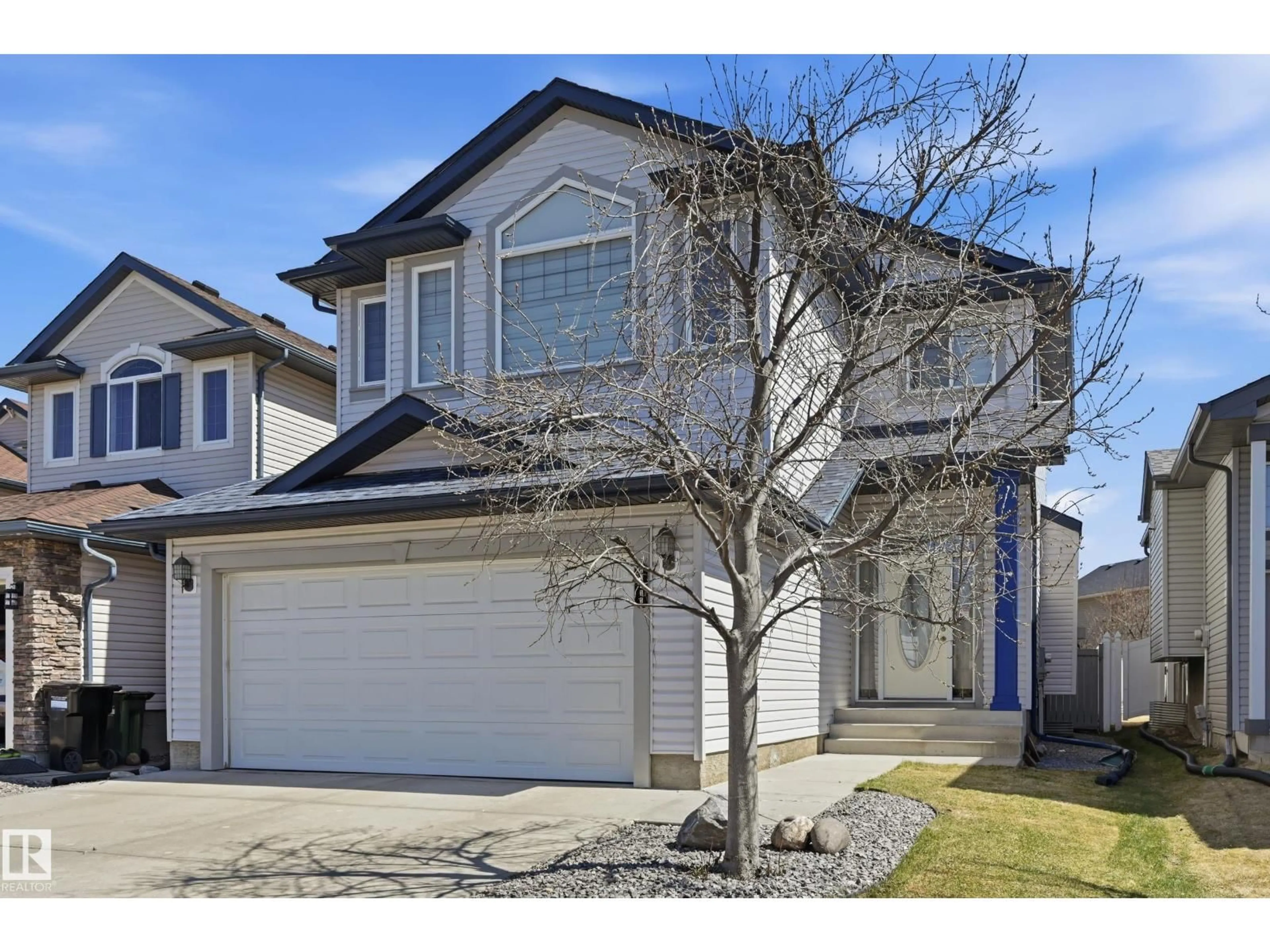 Home with vinyl exterior material, street for NW - 16411 43 ST, Edmonton Alberta T5Y0H8