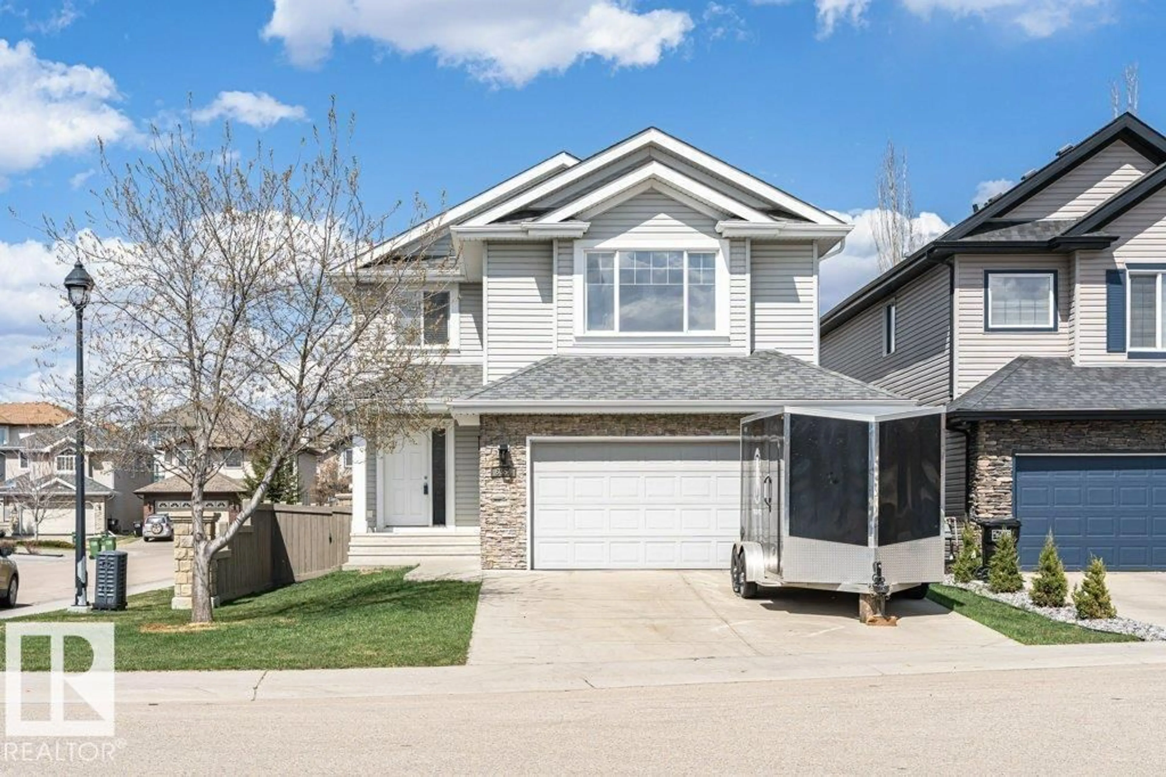 Home with vinyl exterior material, street for 6354 SANDIN WY, Edmonton Alberta T6R0K1