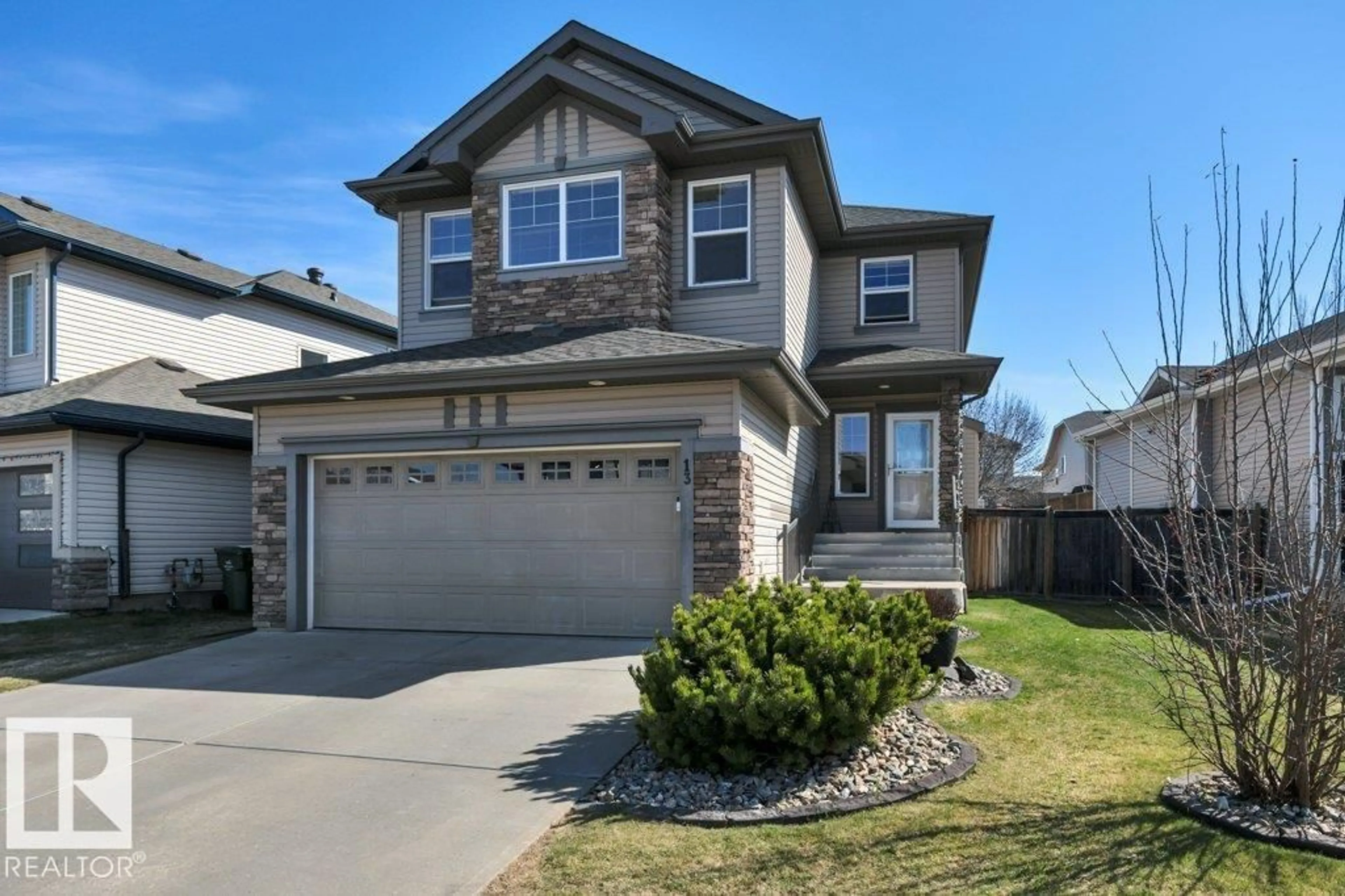 Home with vinyl exterior material, street for 13 SELKIRK PL, Leduc Alberta T9E0L4