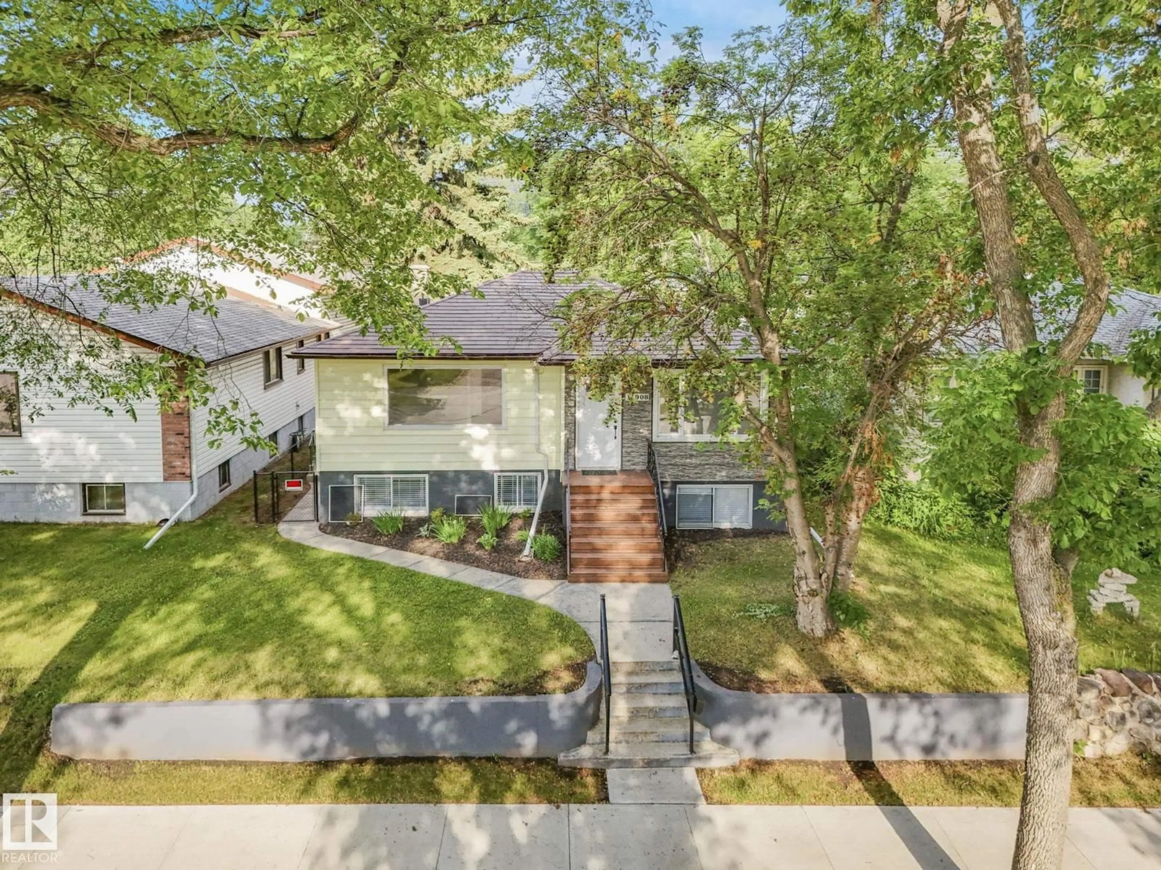 A pic from outside/outdoor area/front of a property/back of a property/a pic from drone, street for NW - 11908 52 ST, Edmonton Alberta T5W3J6