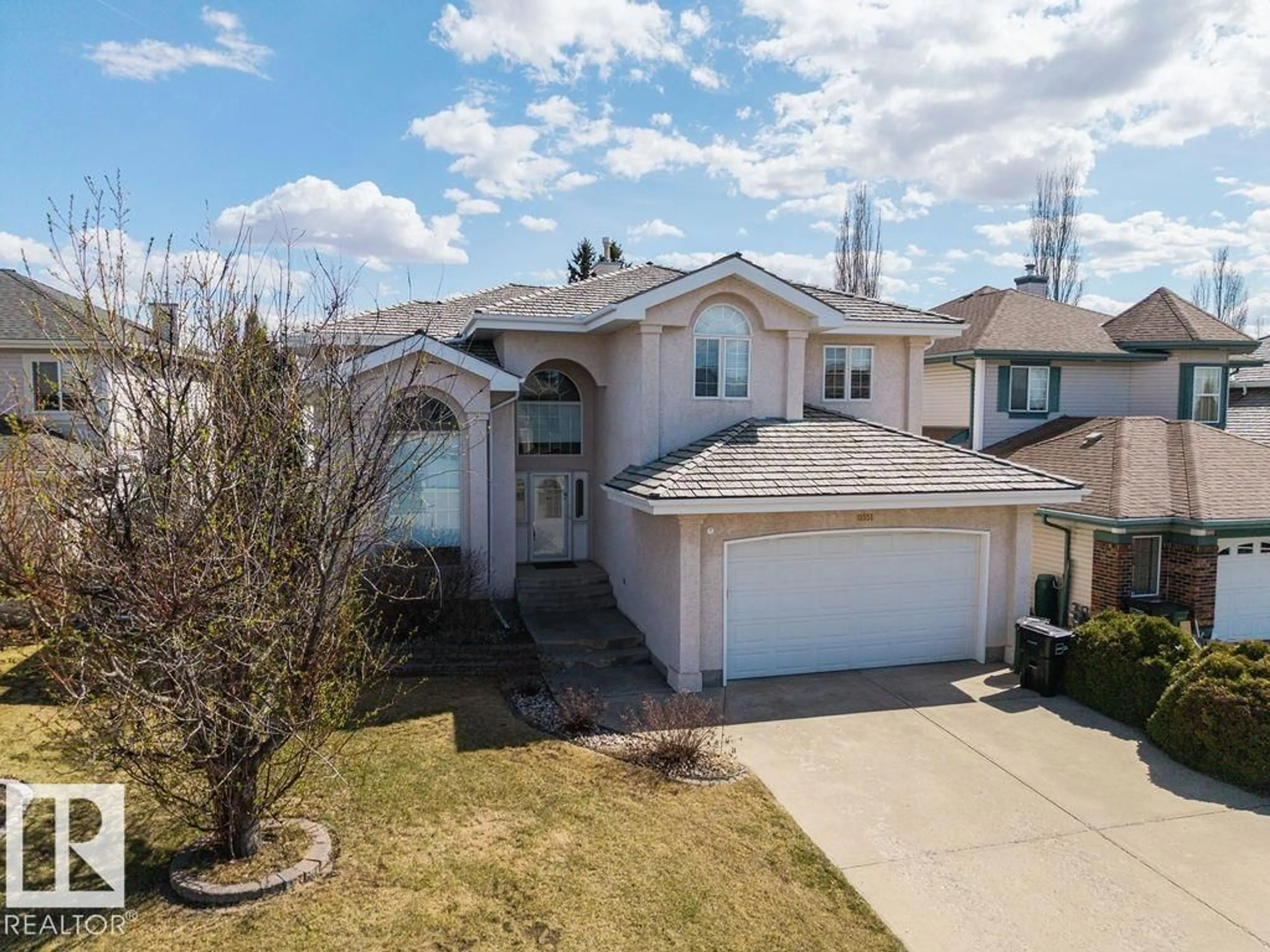 A pic from outside/outdoor area/front of a property/back of a property/a pic from drone, street for 11551 14 AV, Edmonton Alberta T6J7B3