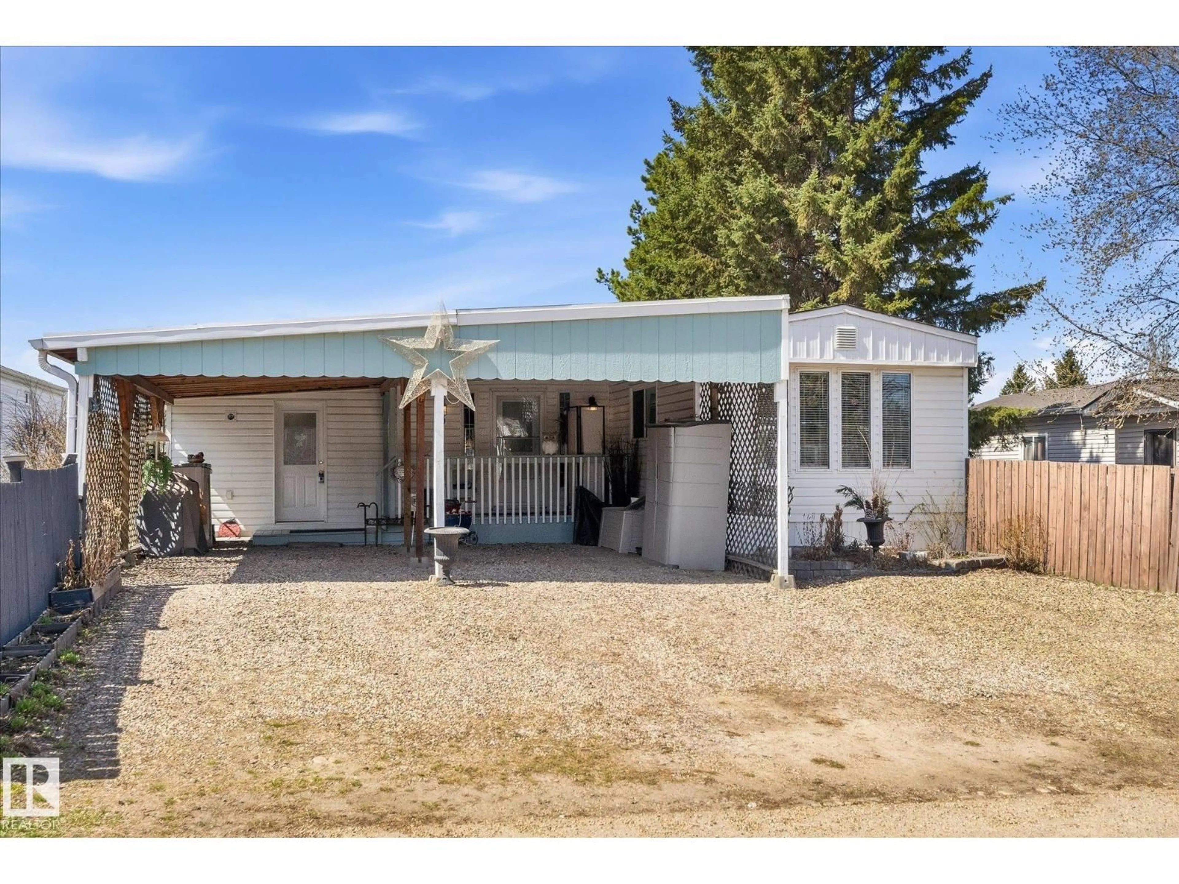 Home with vinyl exterior material, street for 50 305 CALAHOO ROAD, Spruce Grove Alberta T7X3K6