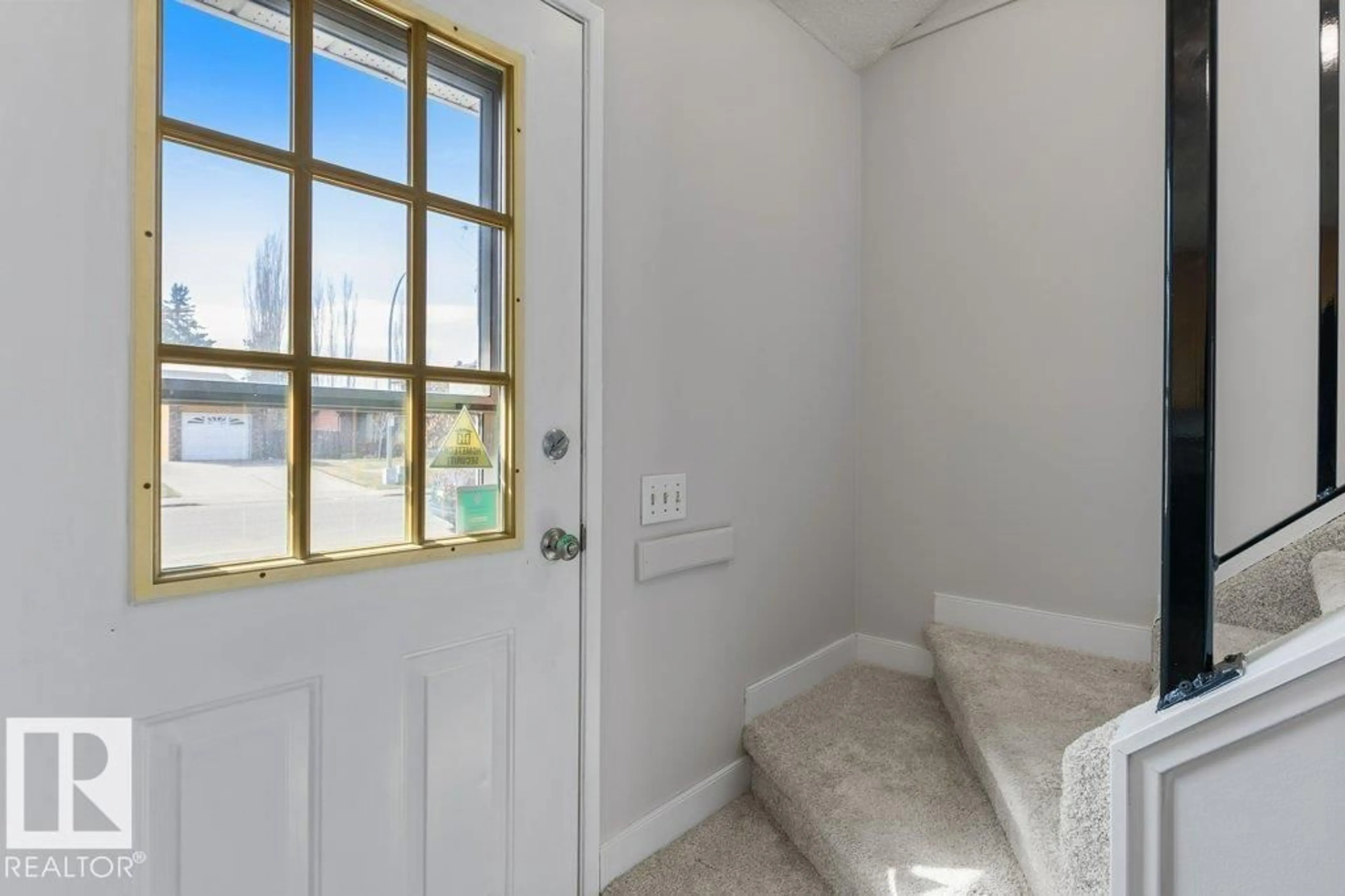 Indoor entryway for 3736 12 AV, Edmonton Alberta T6L3B2