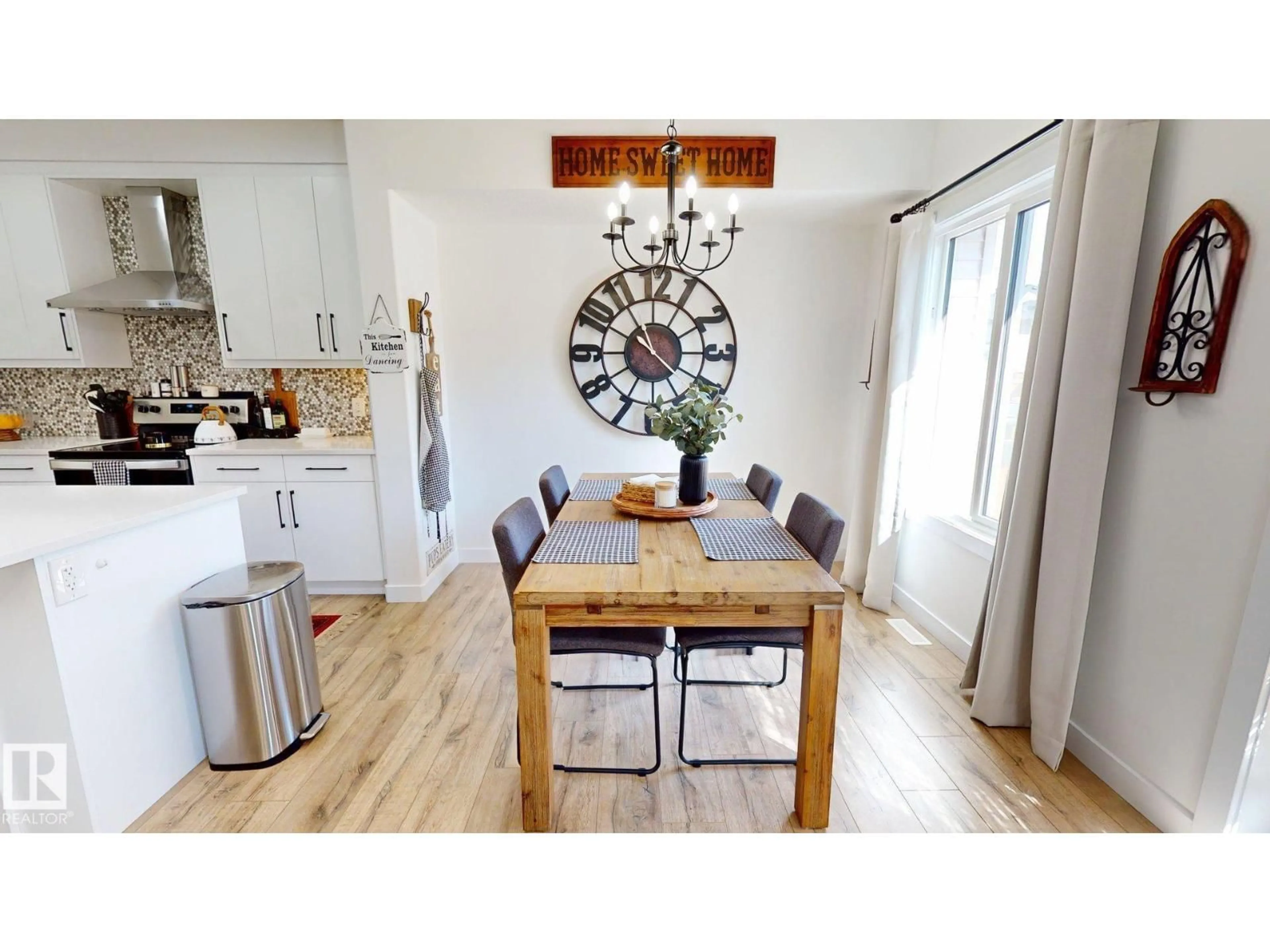 Open concept kitchen, wood/laminate floor for 7217 CHIVERS PL, Edmonton Alberta T6W4L4