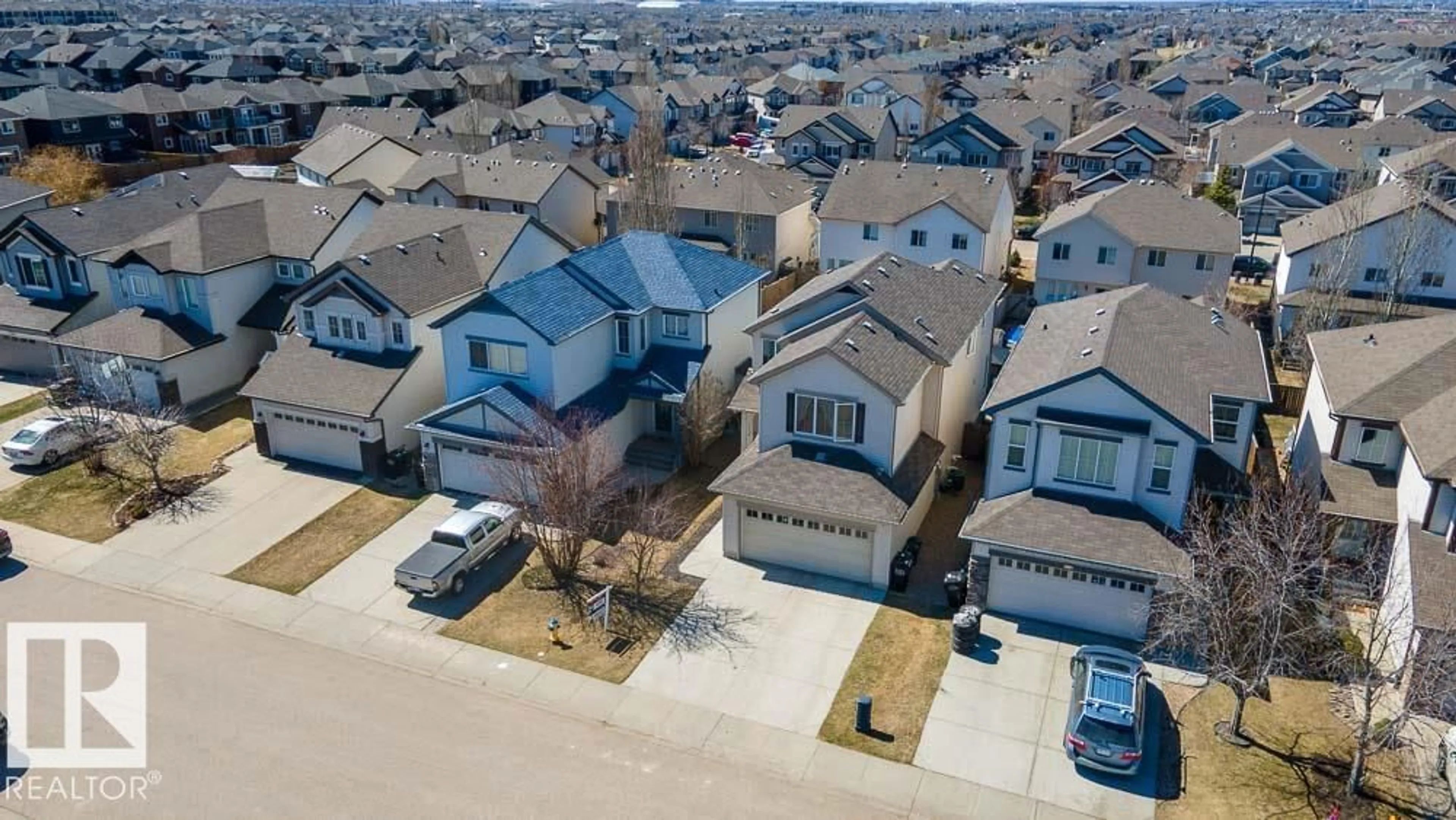 A pic from outside/outdoor area/front of a property/back of a property/a pic from drone, street for SW - 1734 63A ST, Edmonton Alberta T6X0R8