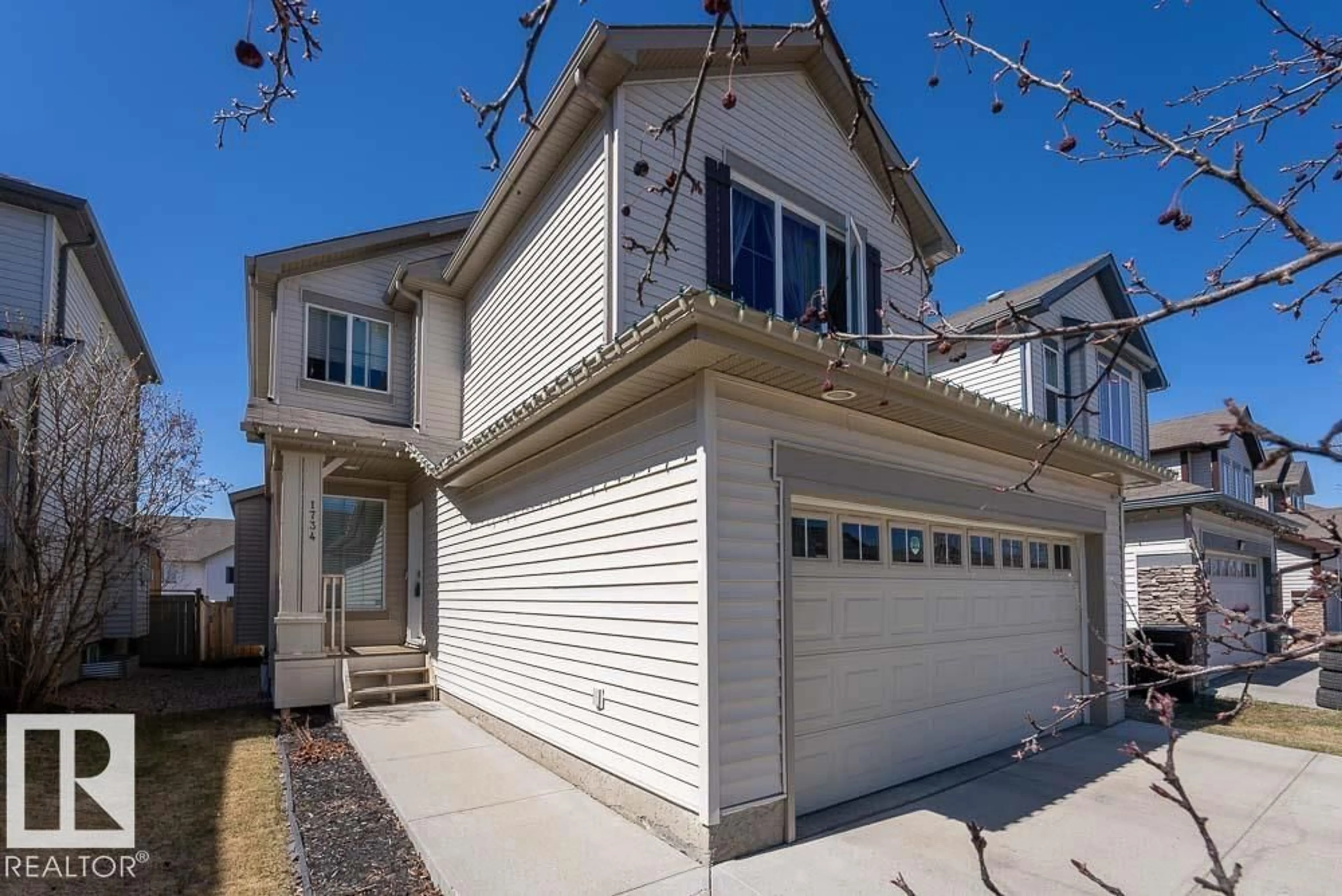 Home with vinyl exterior material, street for SW - 1734 63A ST, Edmonton Alberta T6X0R8