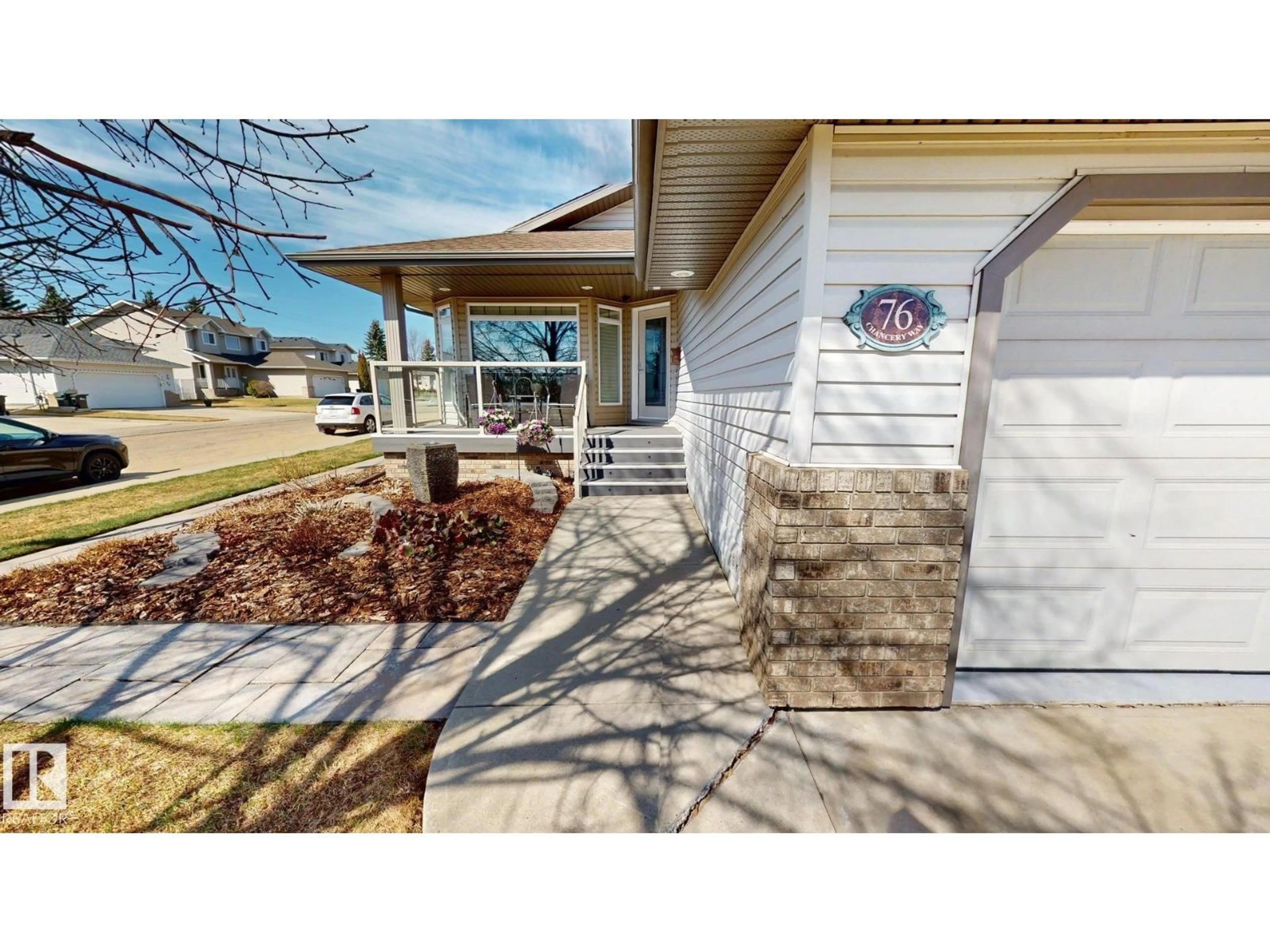 Home with vinyl exterior material, street for 76 CHANCERY WY, Sherwood Park Alberta T8H1Z3