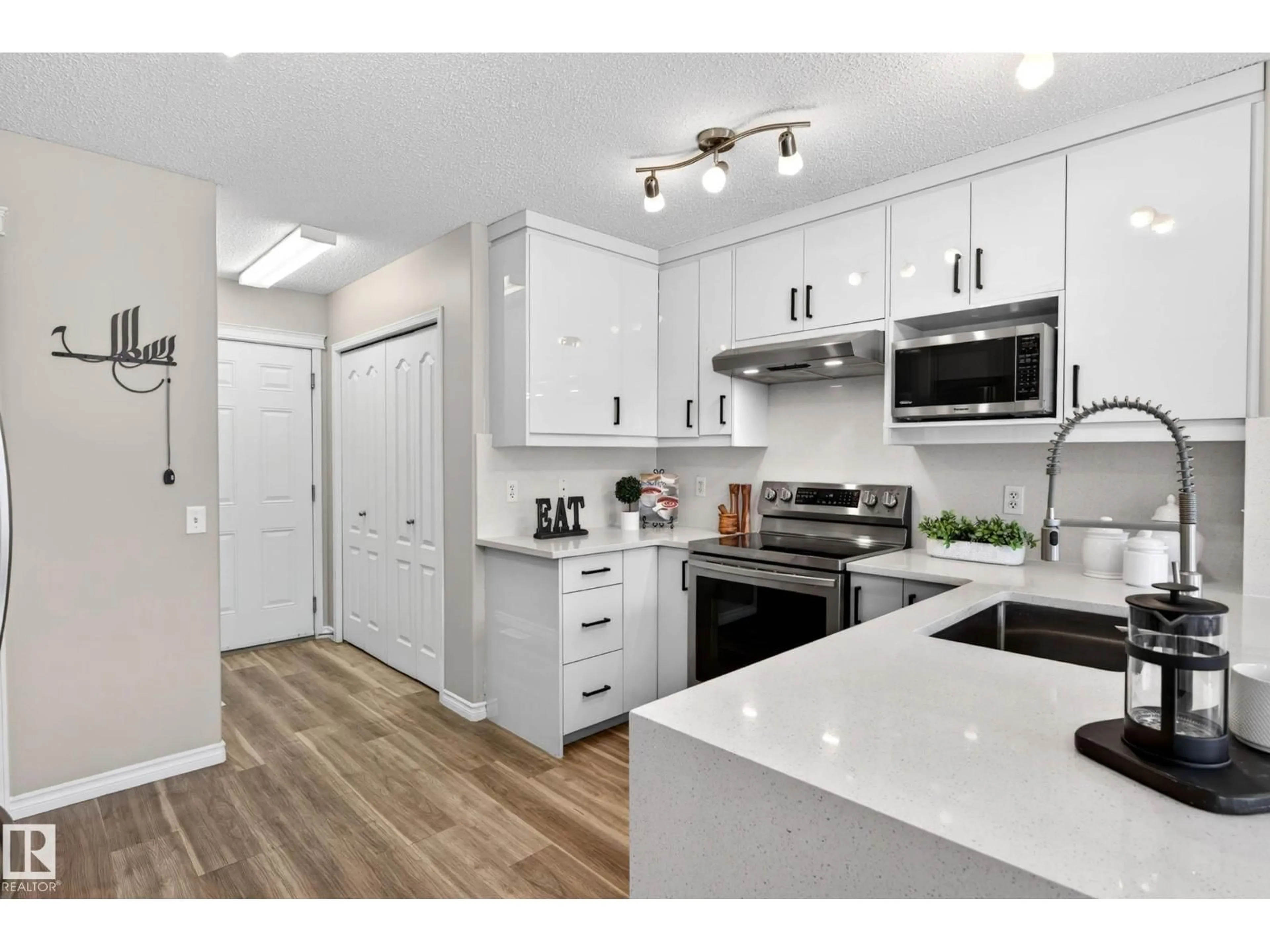 Open concept kitchen, unknown for 7723 7A AV, Edmonton Alberta T6X0A2
