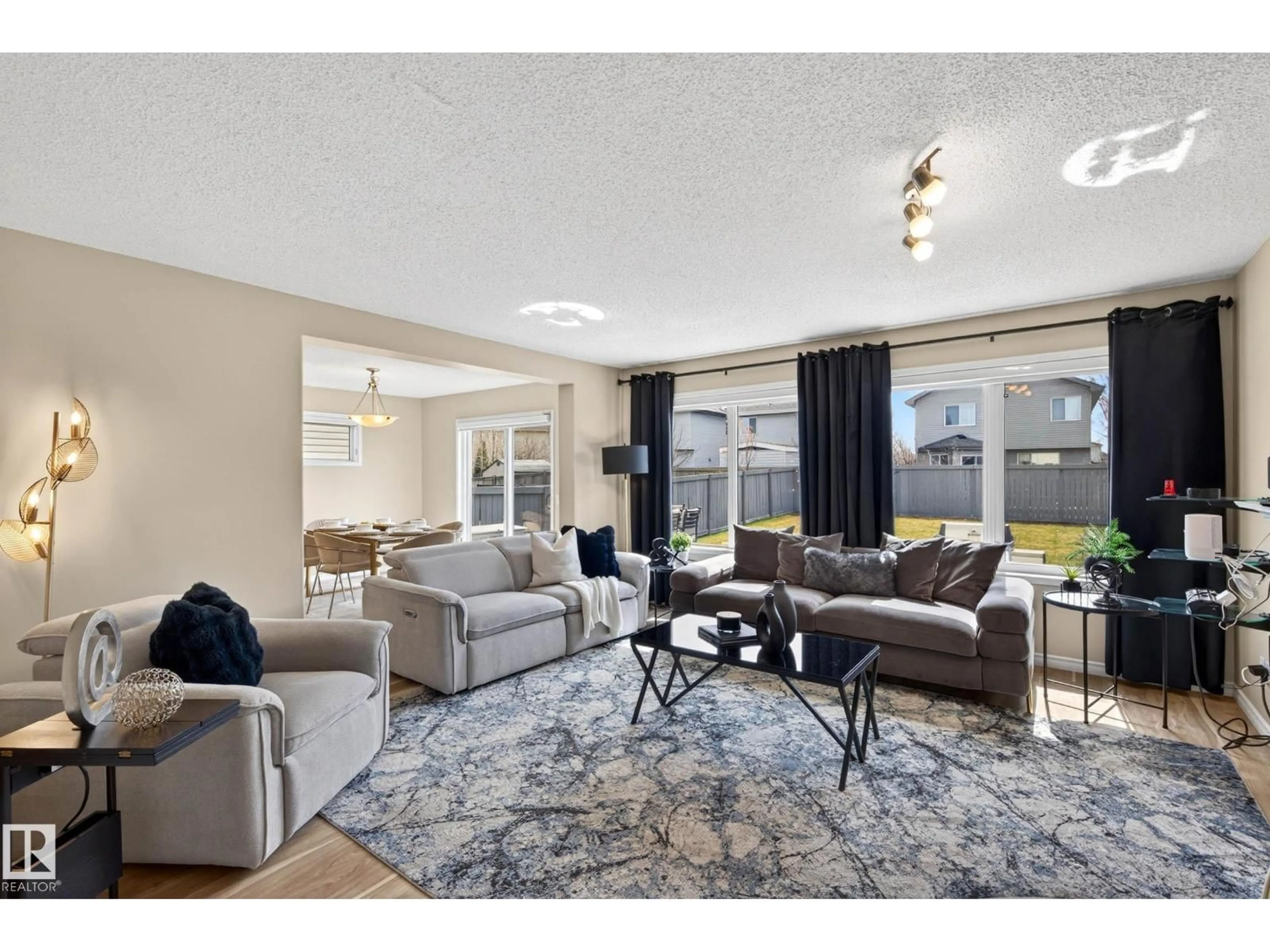 Living room with furniture, unknown for 7723 7A AV, Edmonton Alberta T6X0A2