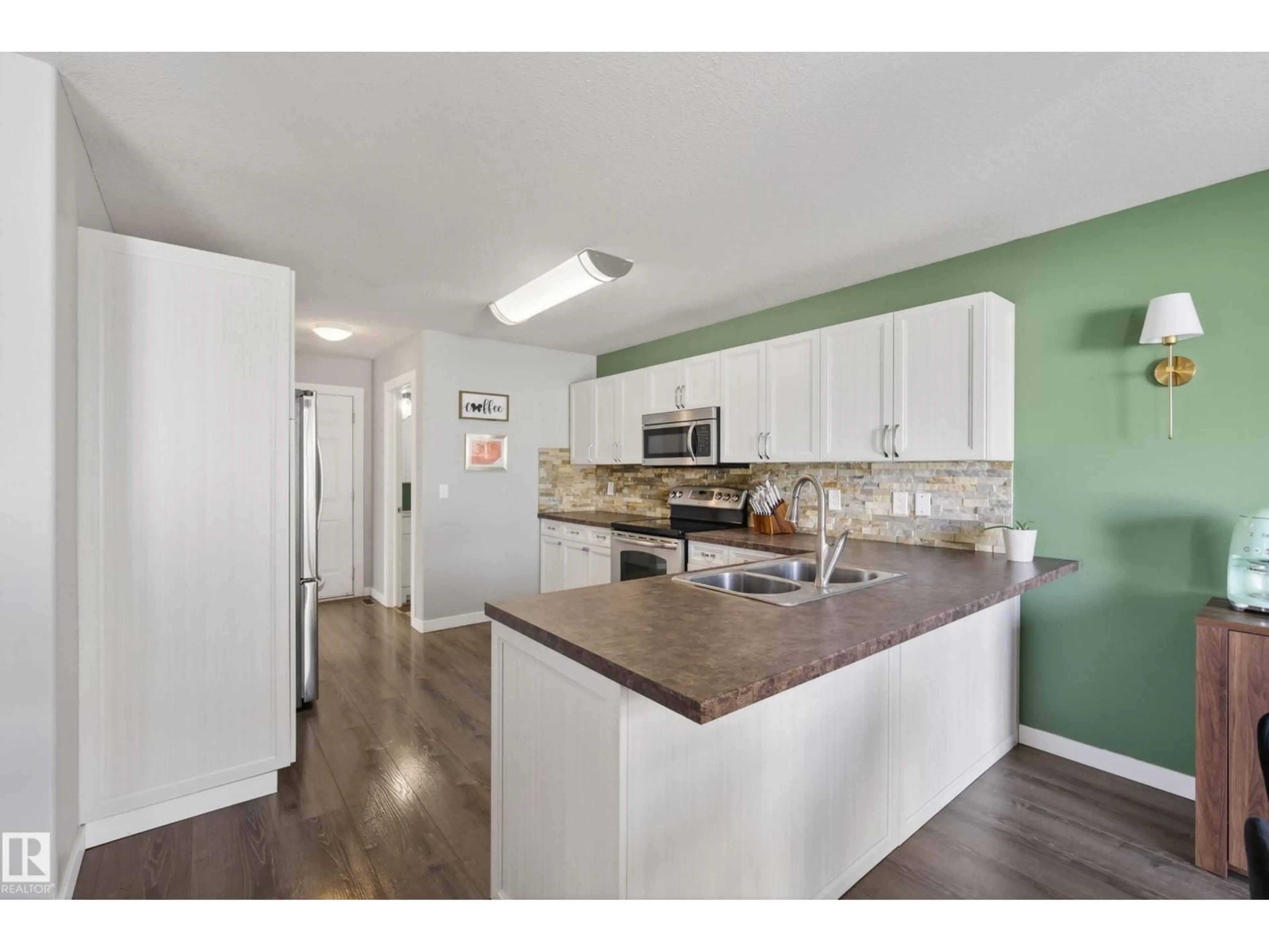 Open concept kitchen, unknown for NW - 16230 131A ST, Edmonton Alberta T6V1X5