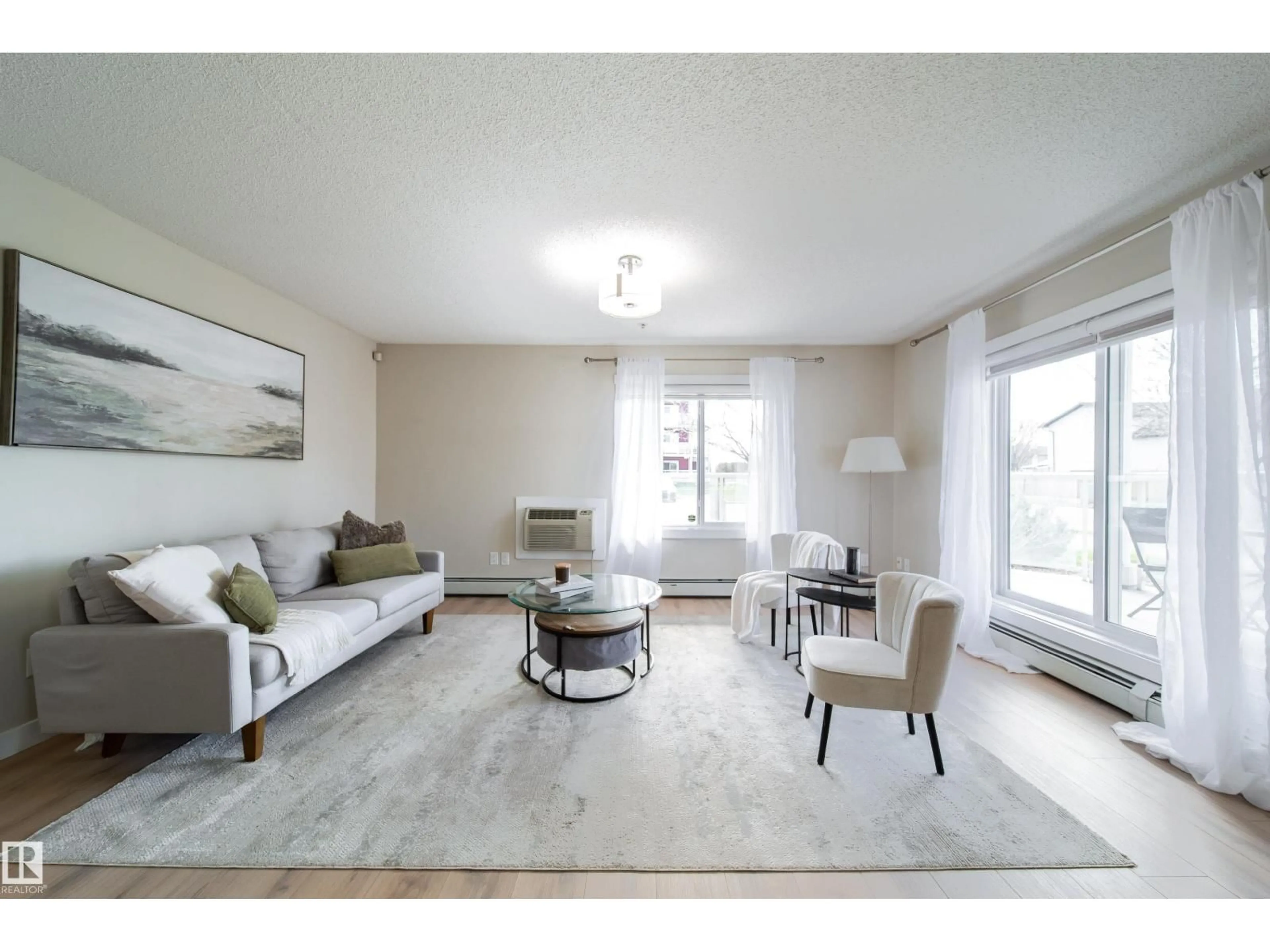 Living room with furniture, unknown for 117 - 2229 44 AV, Edmonton Alberta T6T0W6