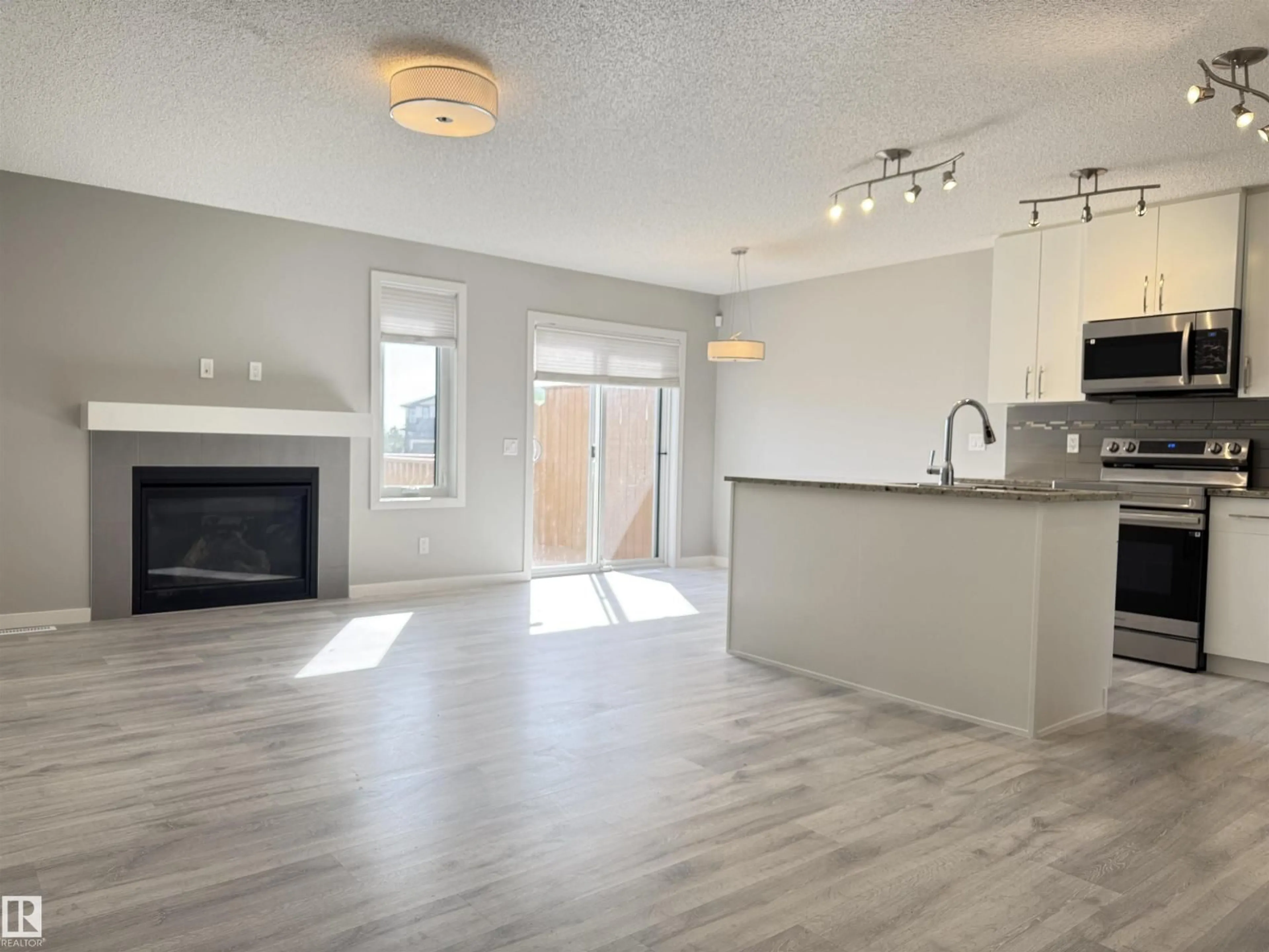 Open concept kitchen, unknown for NW - 12613 45 ST, Edmonton Alberta T5A1L3