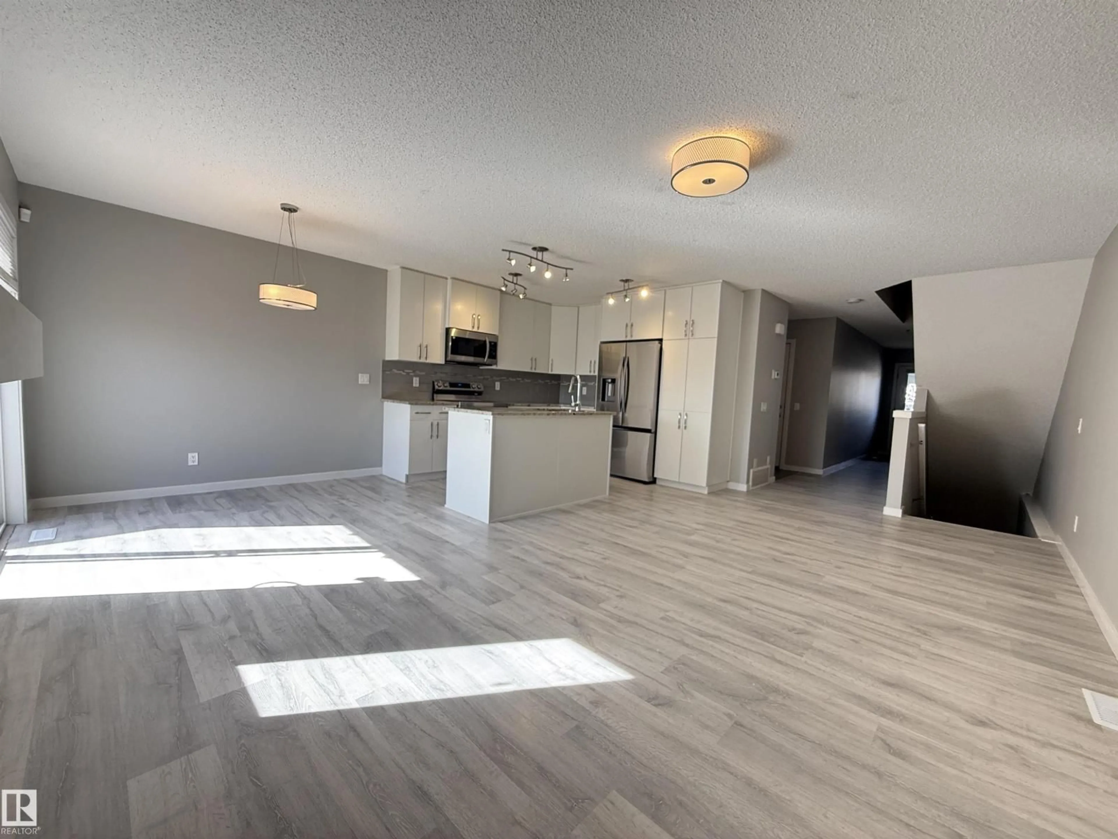 Open concept kitchen, unknown for NW - 12613 45 ST, Edmonton Alberta T5A1L3