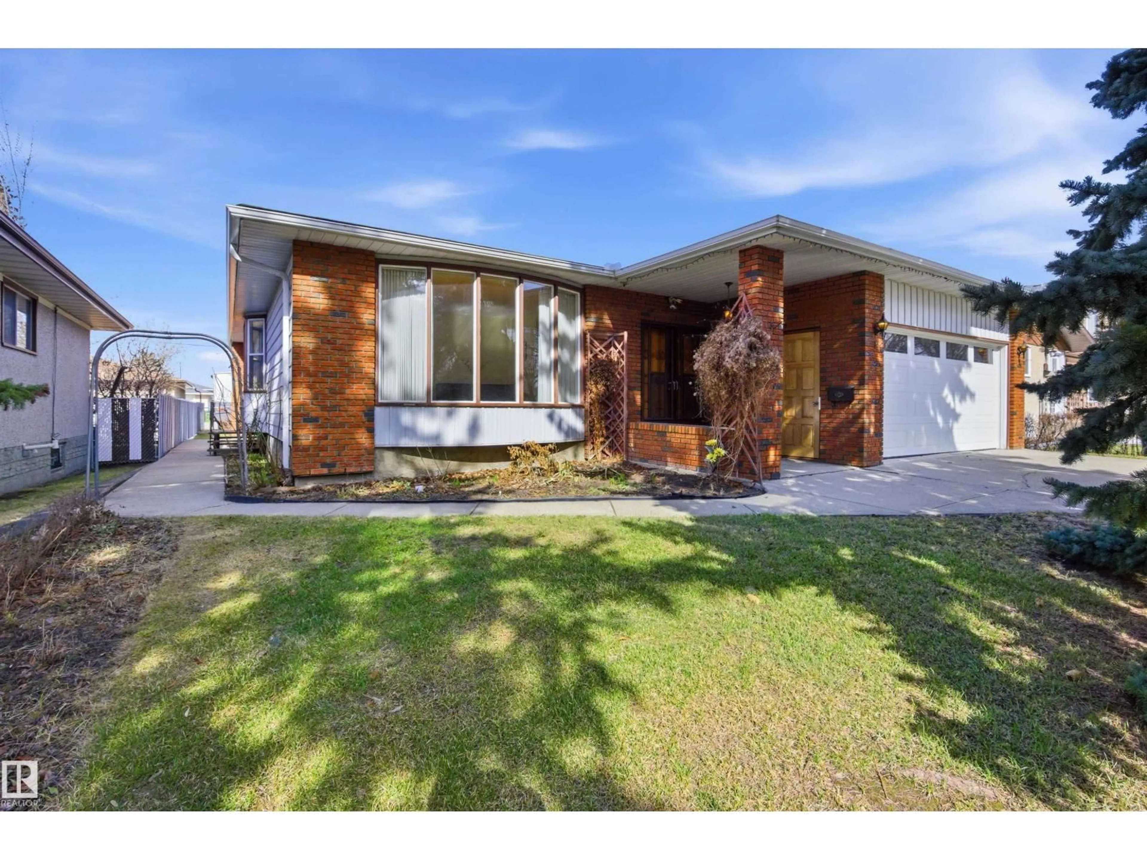 Home with brick exterior material, street for NW - 13222 116 ST, Edmonton Alberta T5E5H7