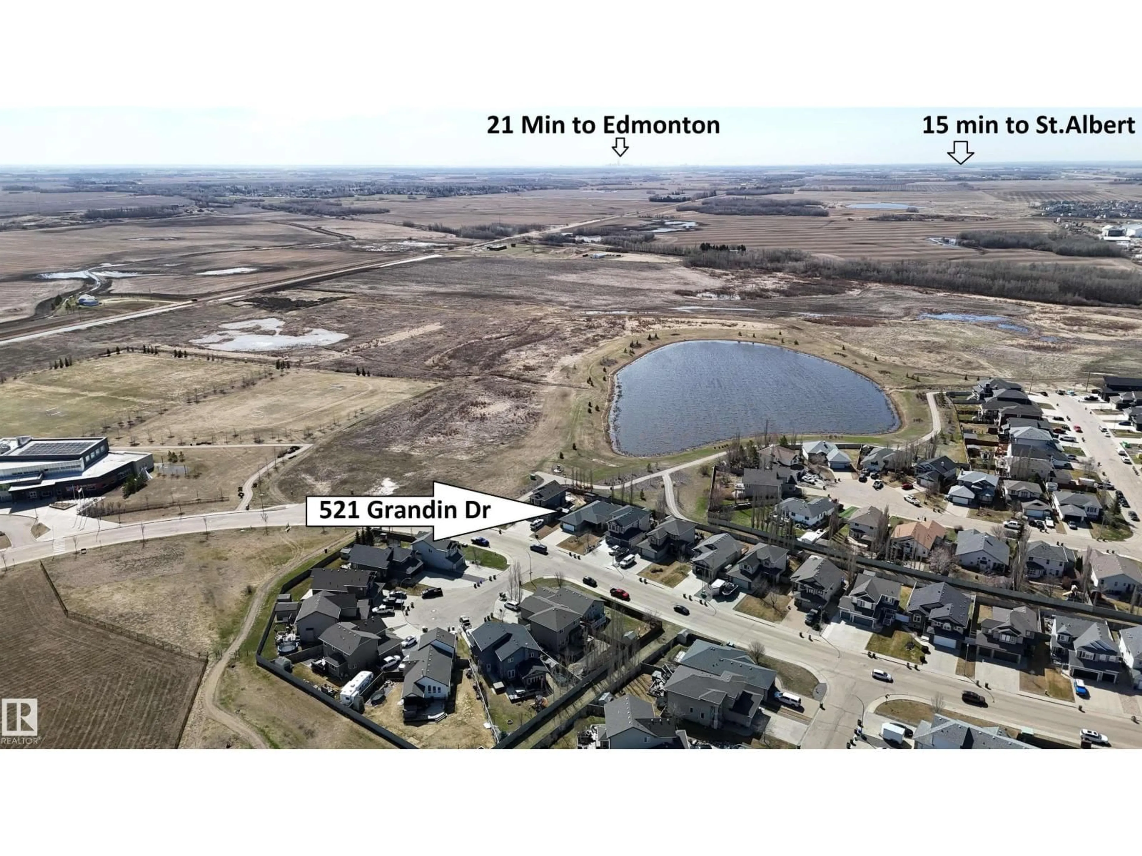 A pic from outside/outdoor area/front of a property/back of a property/a pic from drone, water/lake/river/ocean view for 521 GRANDIN DR, Morinville Alberta T8R0E3