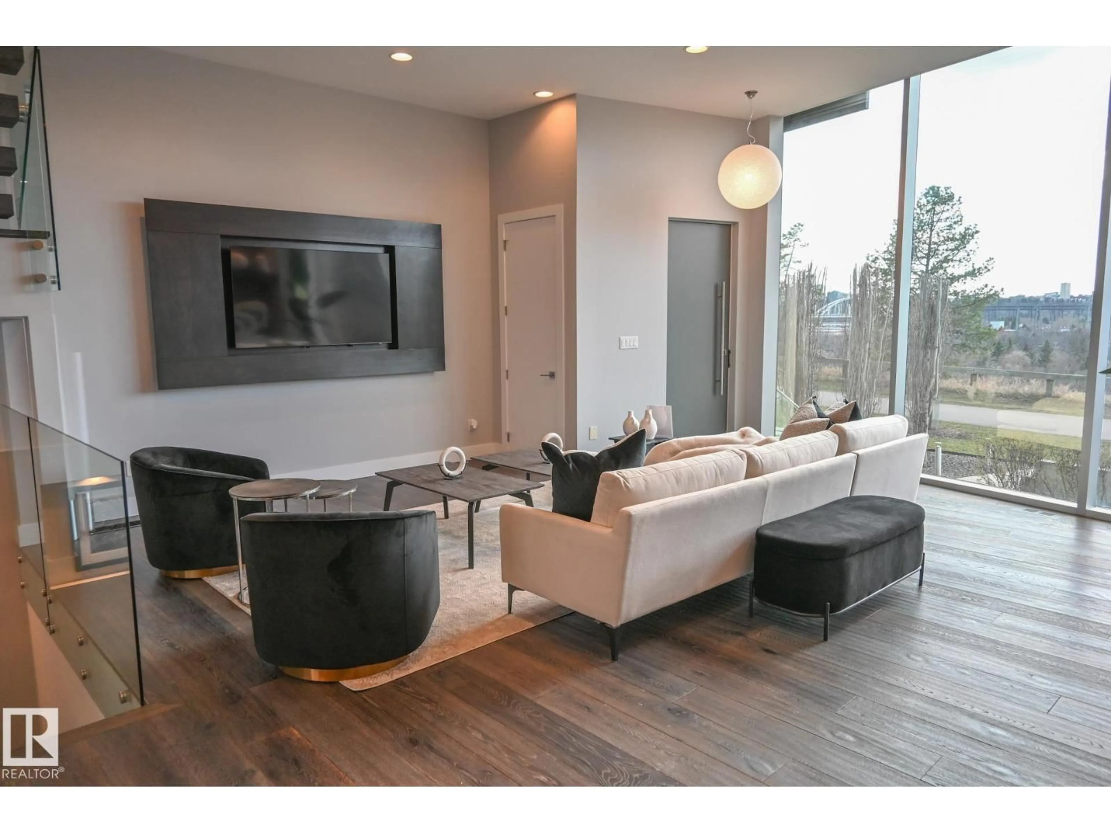 Living room with furniture, wood/laminate floor for NW - 9509 99B ST, Edmonton Alberta T6E3X1