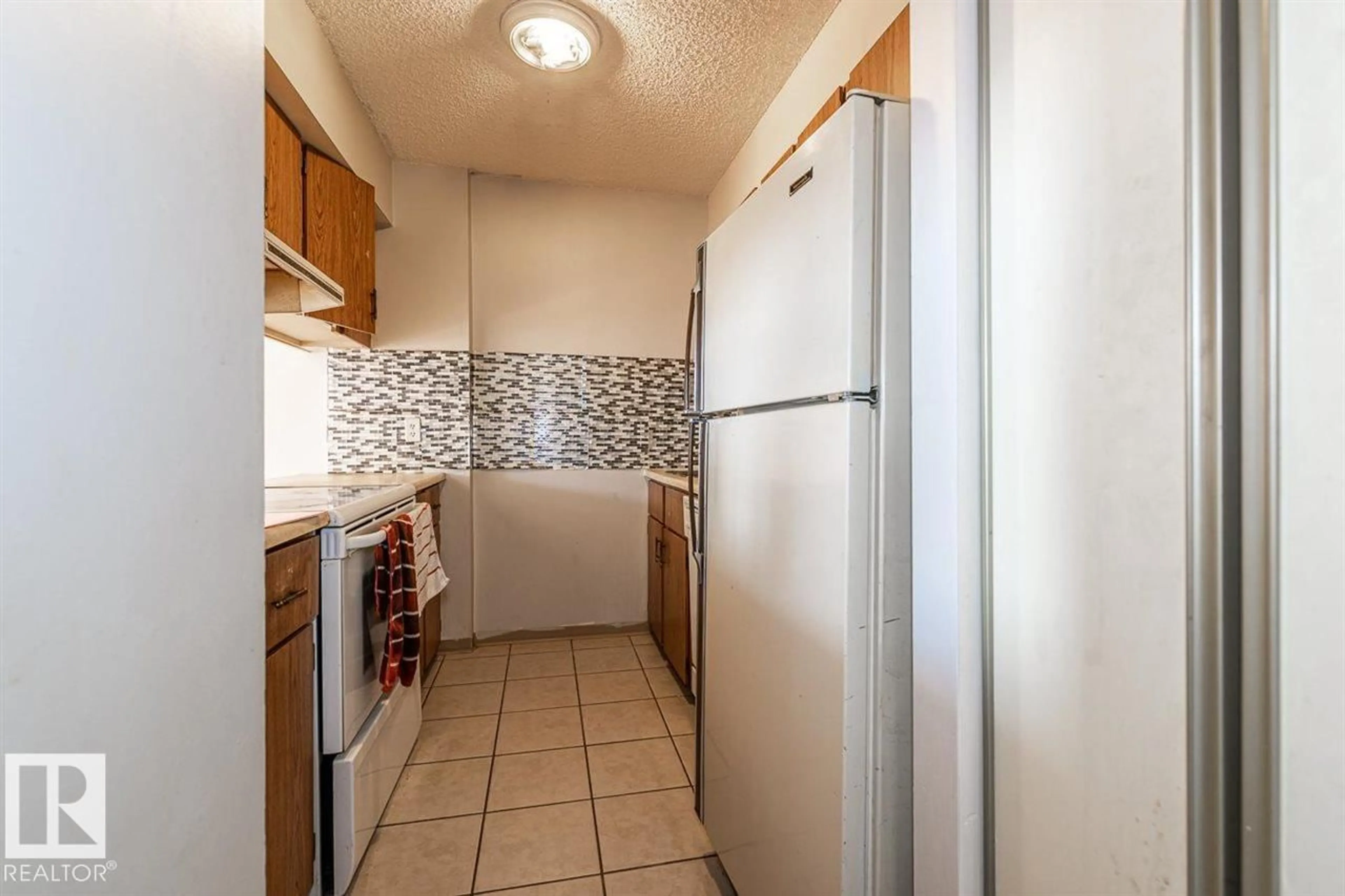 Standard kitchen, ceramic/tile floor for #606 - 12831 66 ST, Edmonton Alberta T5C0A4