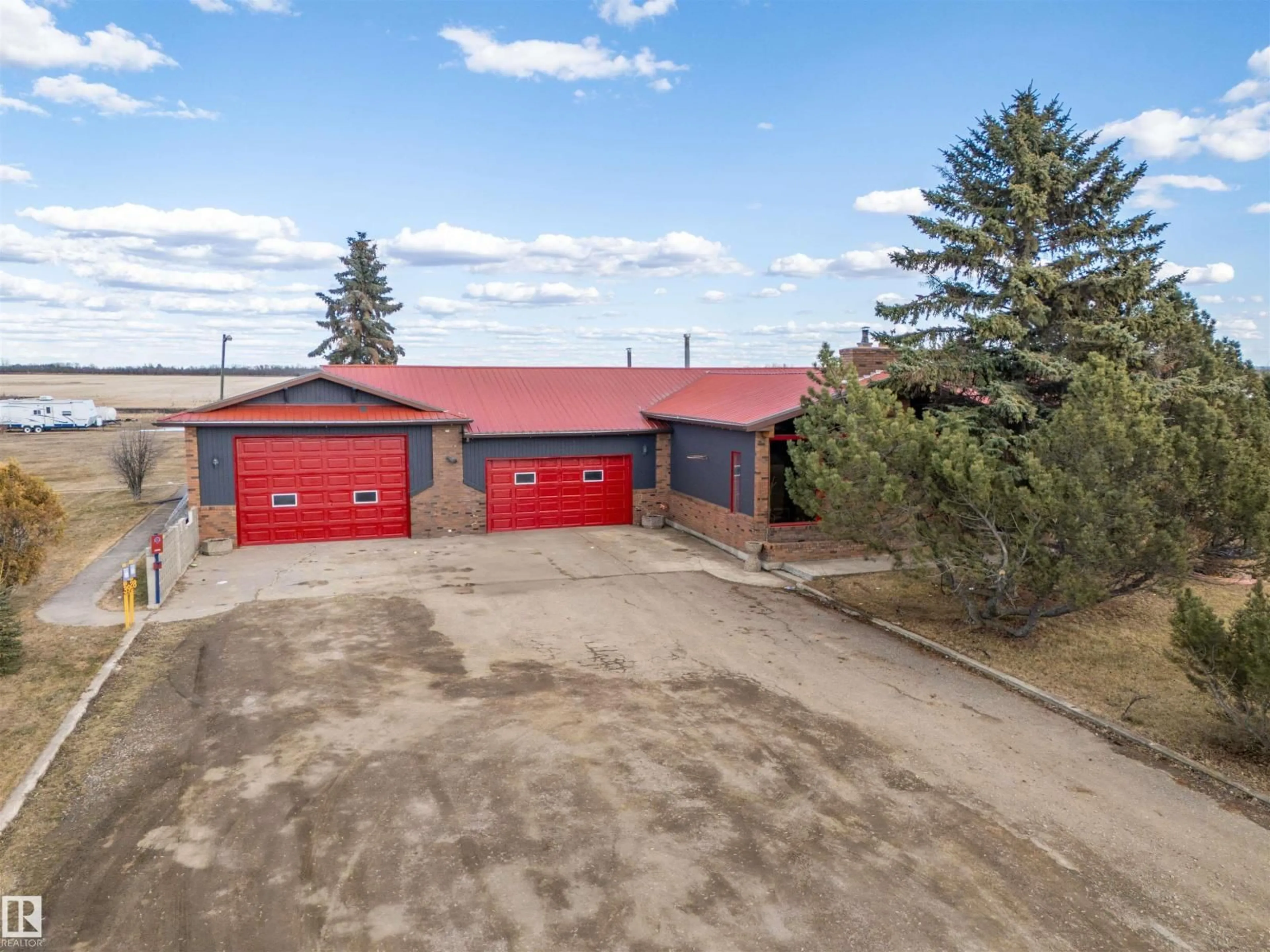 A pic from outside/outdoor area/front of a property/back of a property/a pic from drone, building for 61323 RR 455, Rural Bonnyville M.D. Alberta T9N2G8