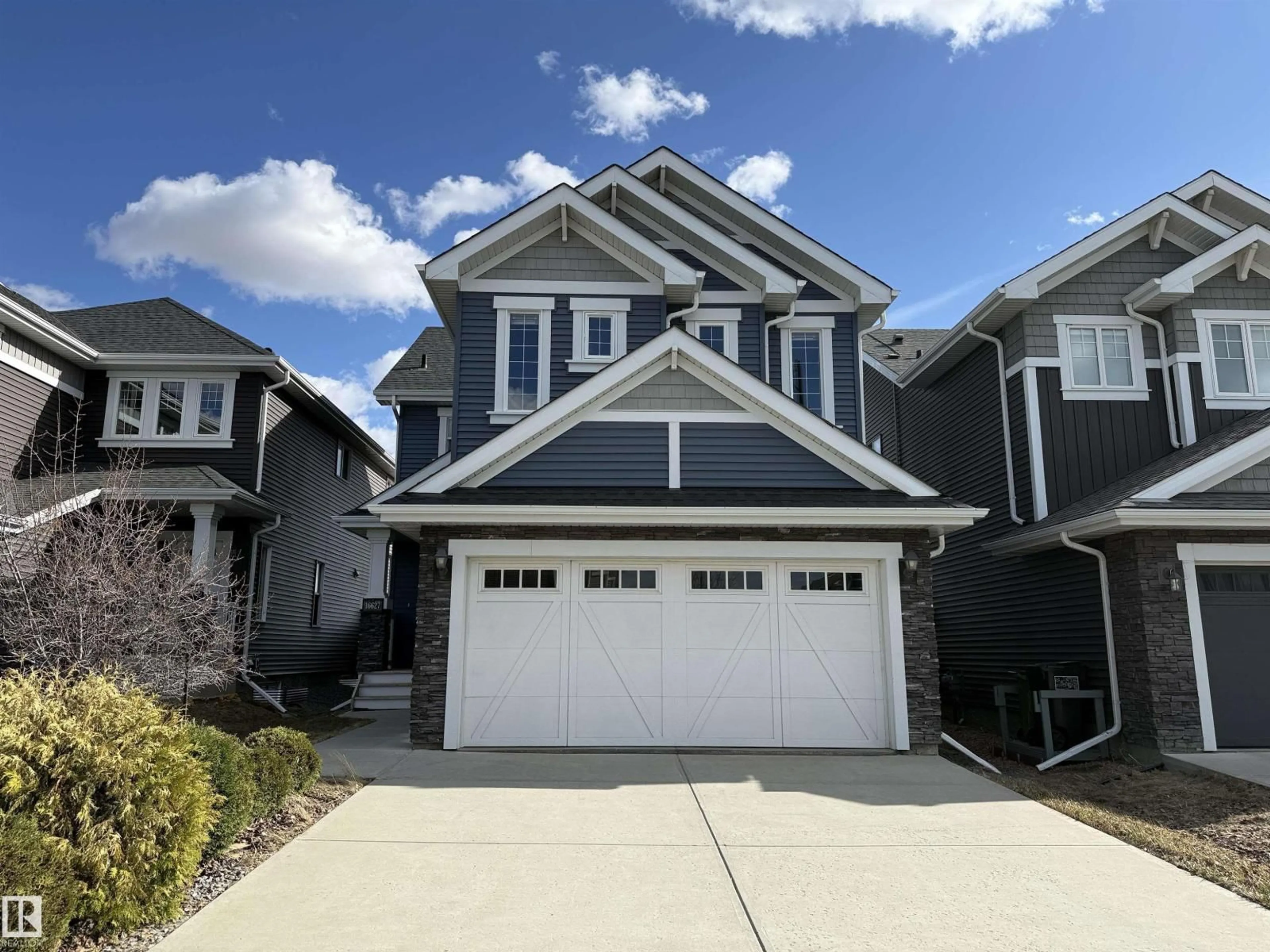 Home with vinyl exterior material, street for SW - 16627 18 AV, Edmonton Alberta T6W3C5