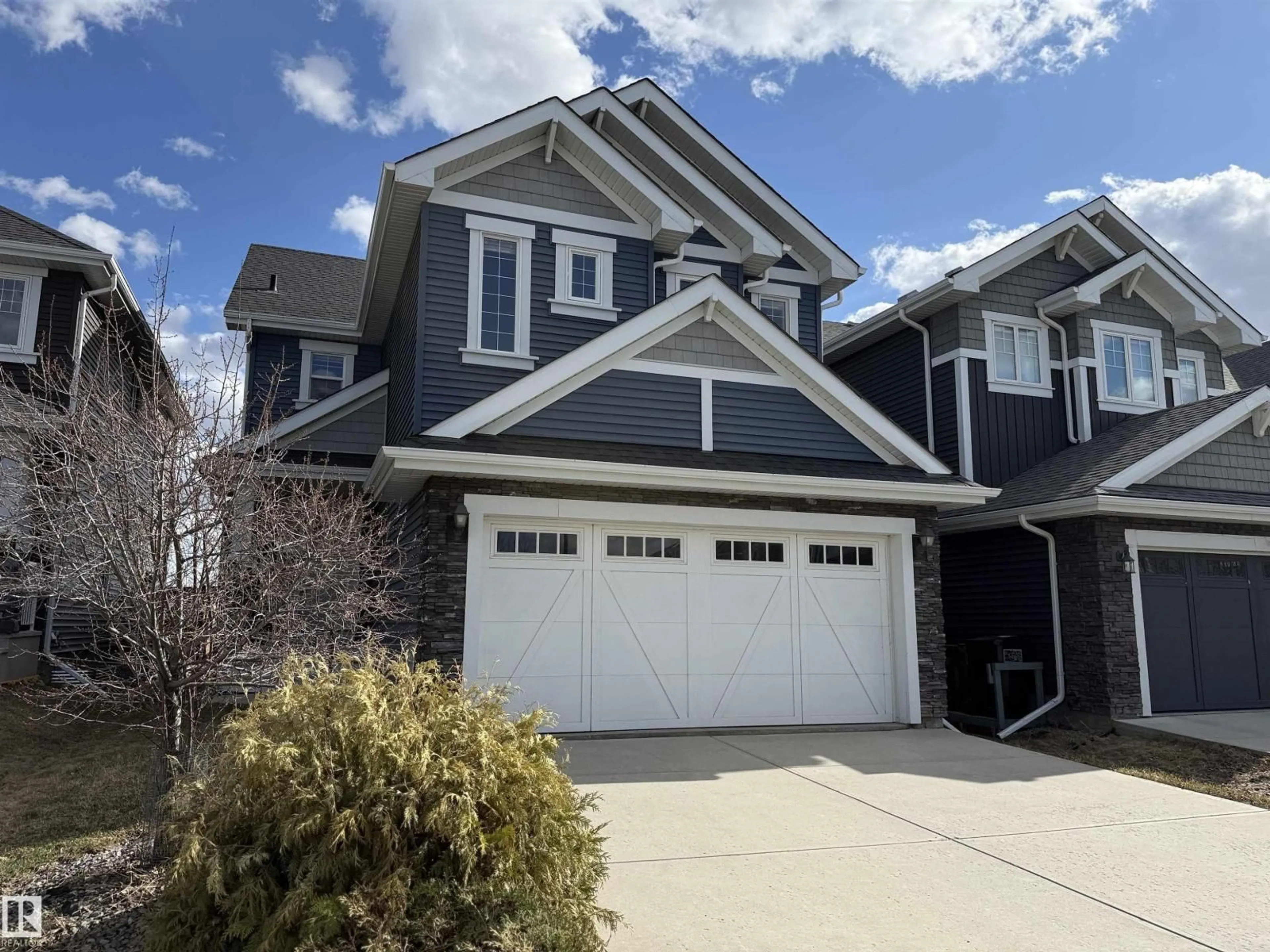 Home with vinyl exterior material, street for SW - 16627 18 AV, Edmonton Alberta T6W3C5