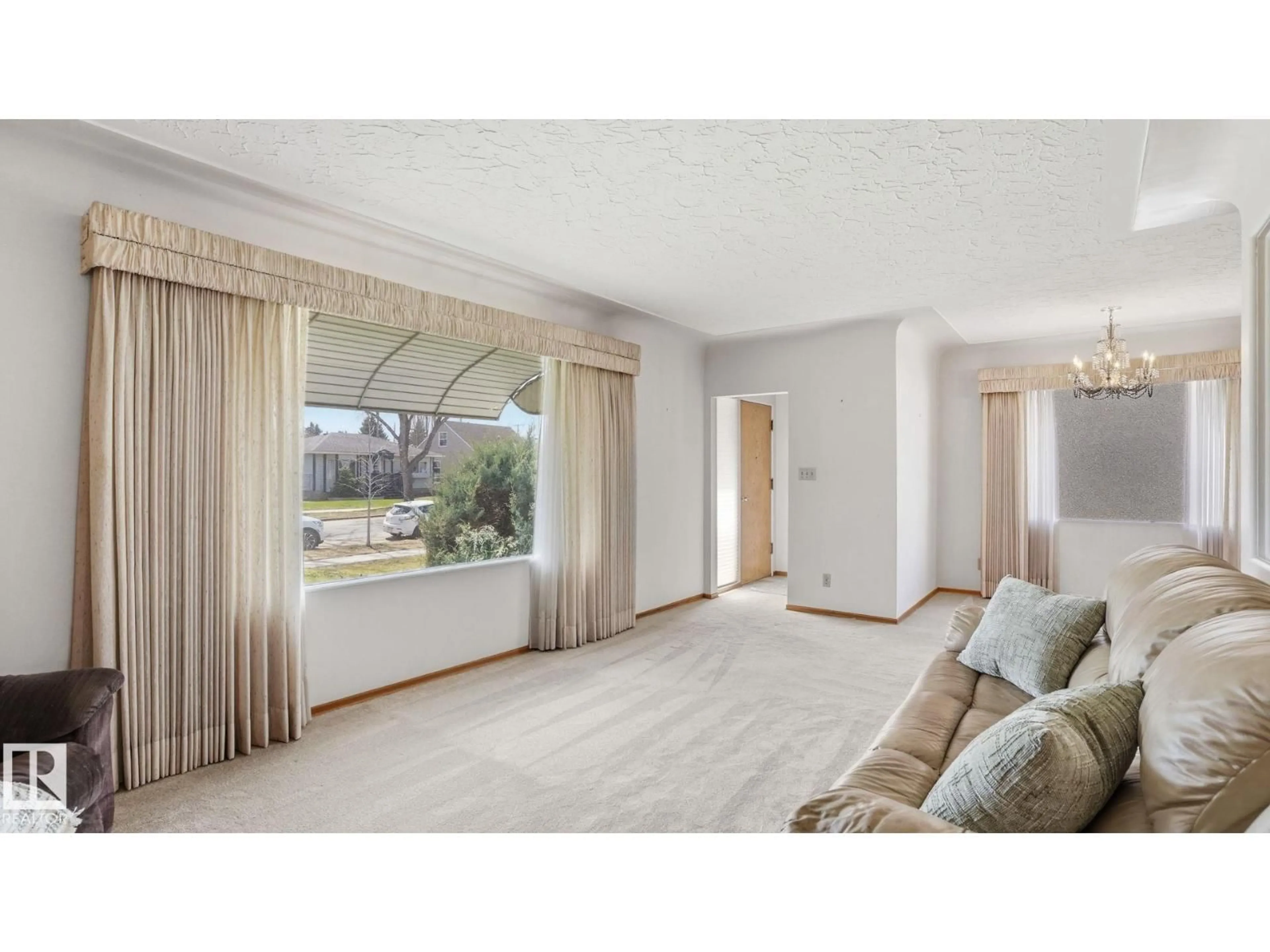 Living room with furniture, unknown for 13024 SHERBROOKE AV, Edmonton Alberta T5L4E8