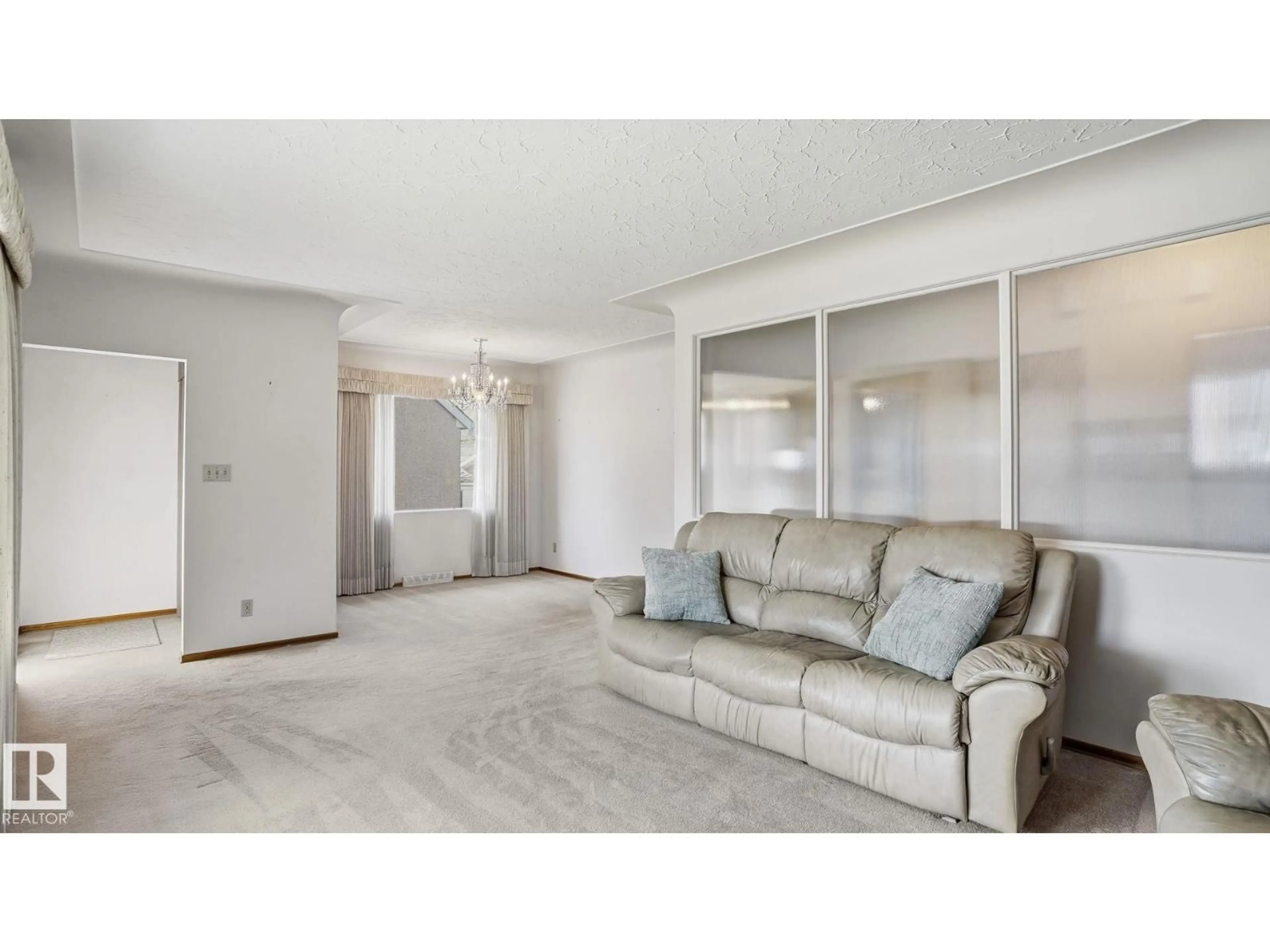 Living room with furniture, unknown for 13024 SHERBROOKE AV, Edmonton Alberta T5L4E8