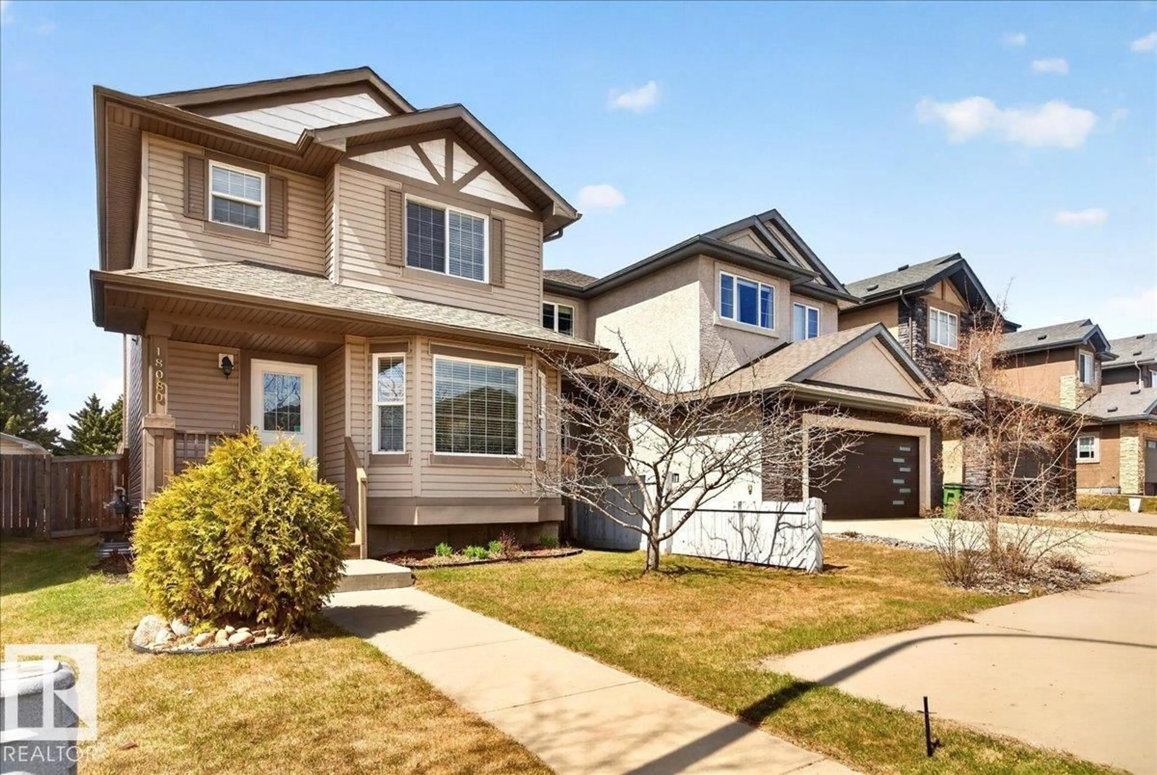 Home with vinyl exterior material, street for 18080 89 ST, Edmonton Alberta T5Z0J5