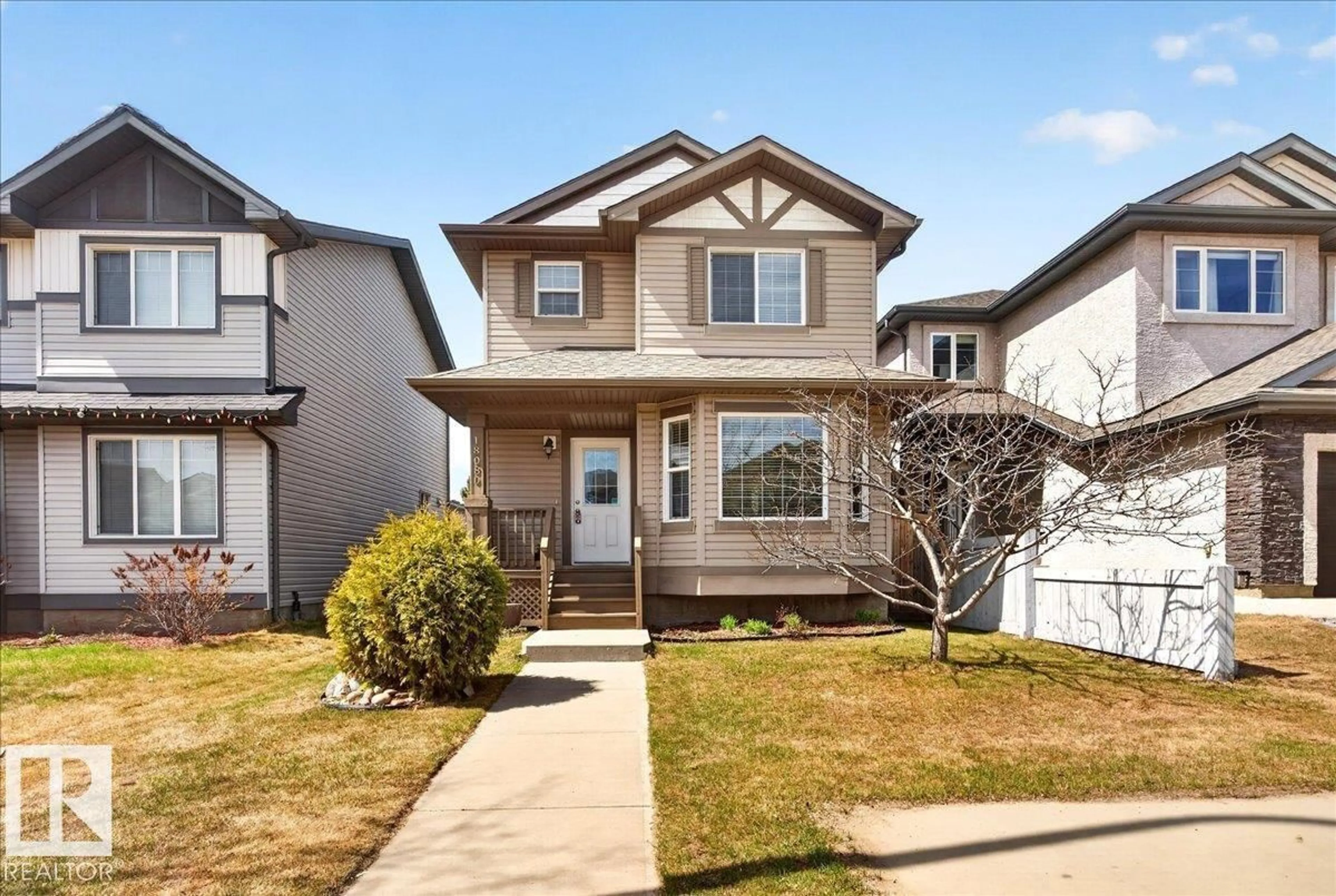 Home with vinyl exterior material, street for 18080 89 ST, Edmonton Alberta T5Z0J5