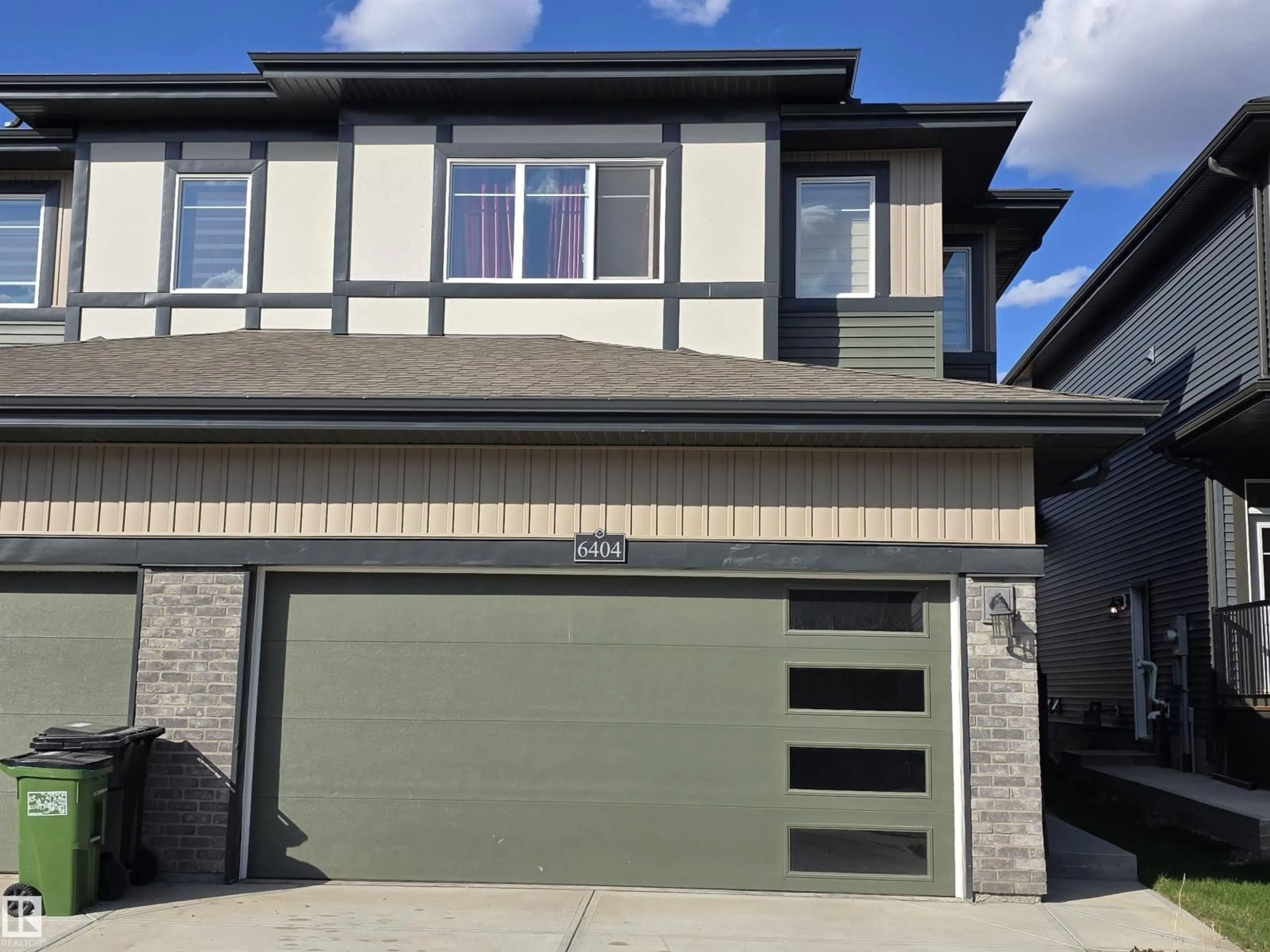 Home with vinyl exterior material, street for 6404 27 AV, Edmonton Alberta T6X3G4