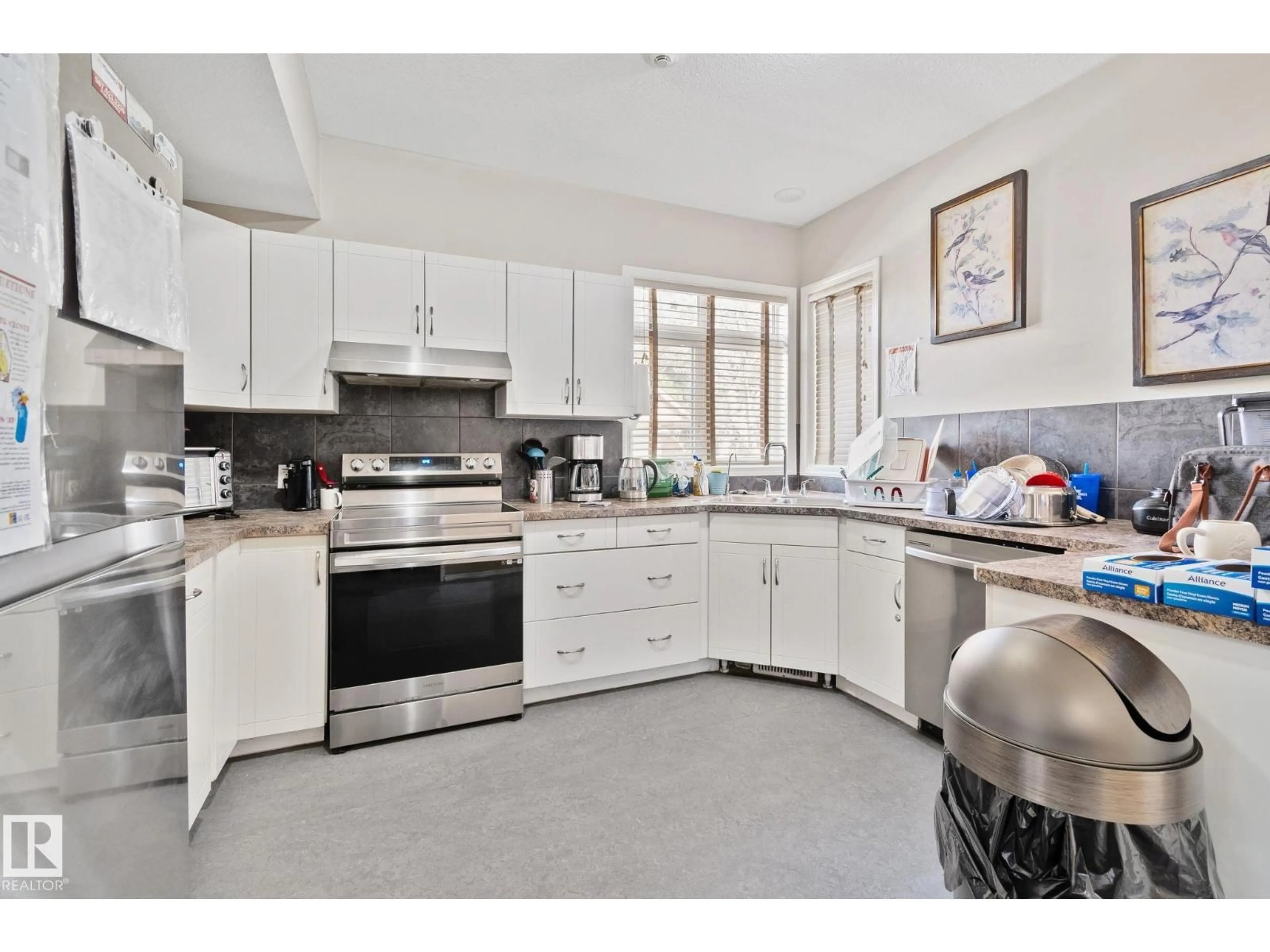 Open concept kitchen, ceramic/tile floor for 9512 154 ST, Edmonton Alberta T5P2E9