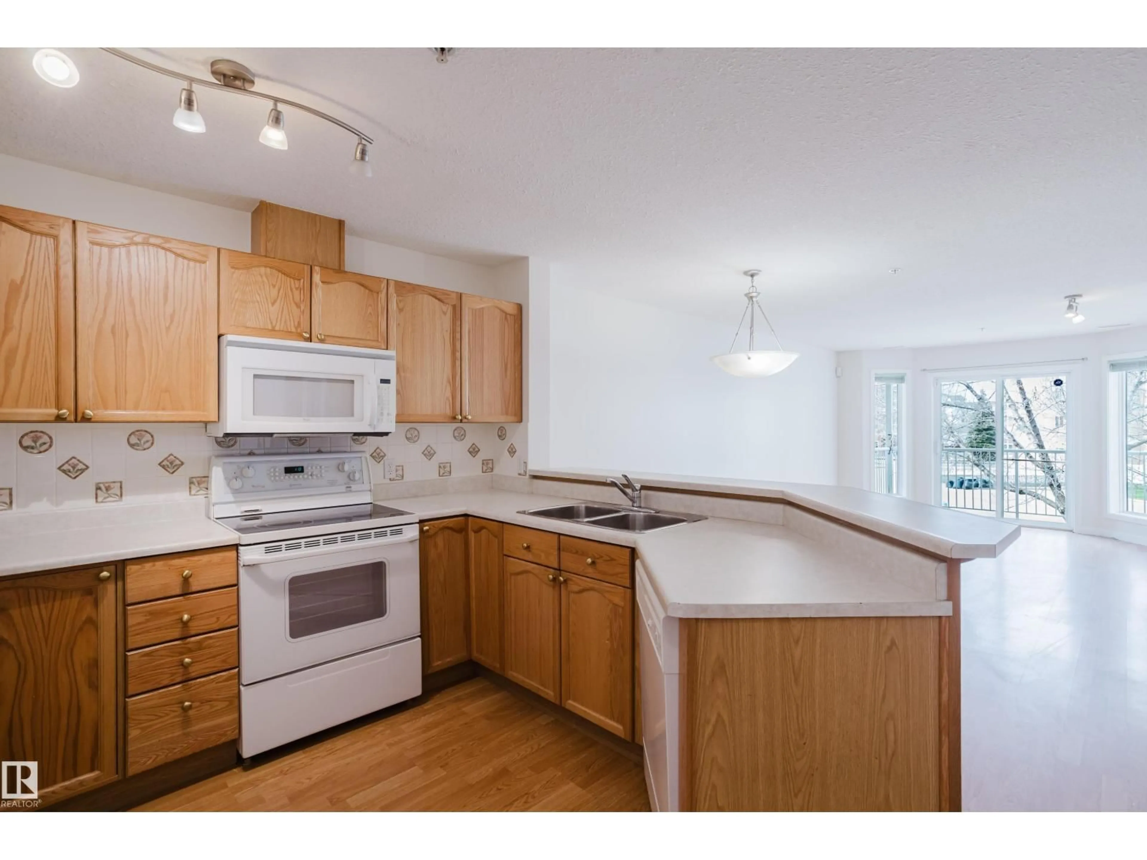 Standard kitchen, unknown for #201 - 4312 139 AV, Edmonton Alberta T5Y3J4