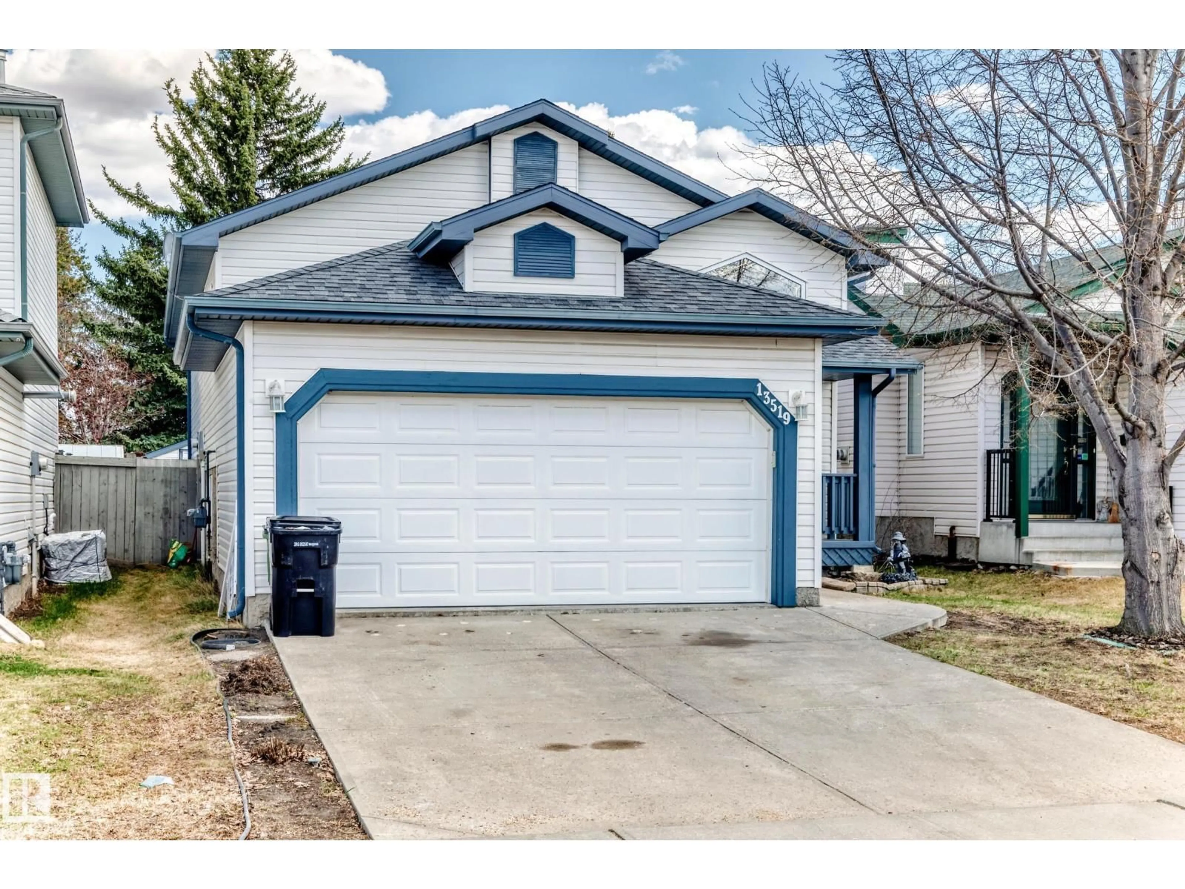 Home with vinyl exterior material, street for 13519 32 ST, Edmonton Alberta T5A5E3