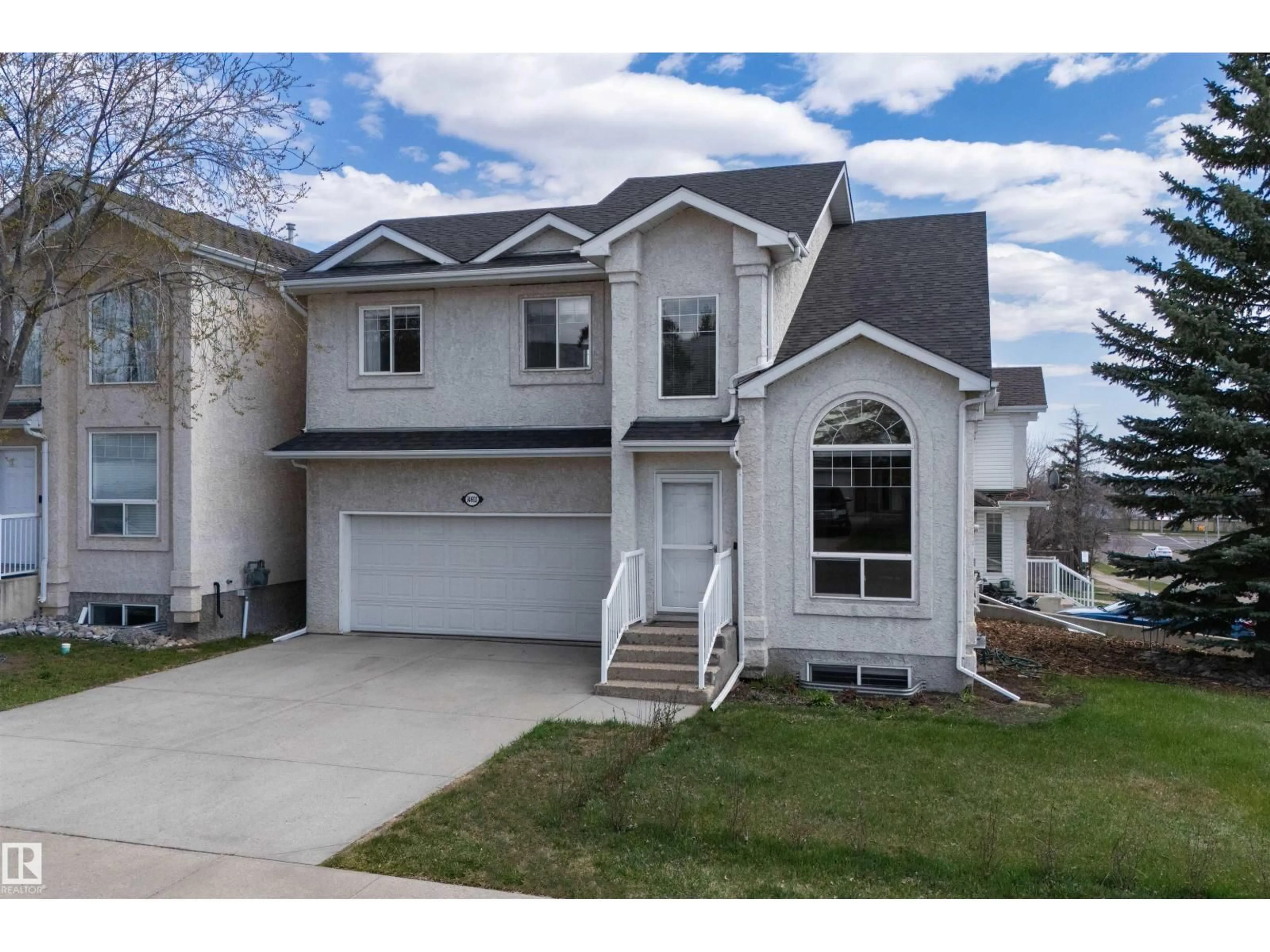 Home with vinyl exterior material, street for 14603 52 ST, Edmonton Alberta T5A5B7