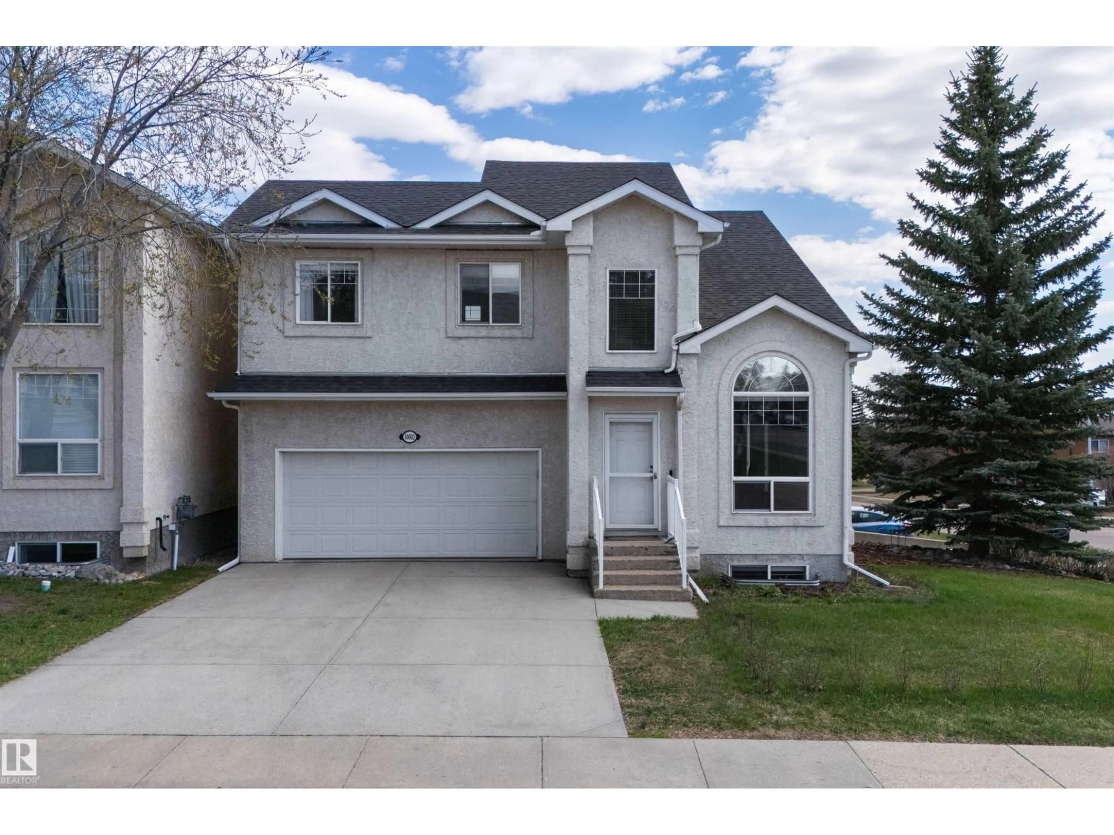 Home with vinyl exterior material, street for 14603 52 ST, Edmonton Alberta T5A5B7