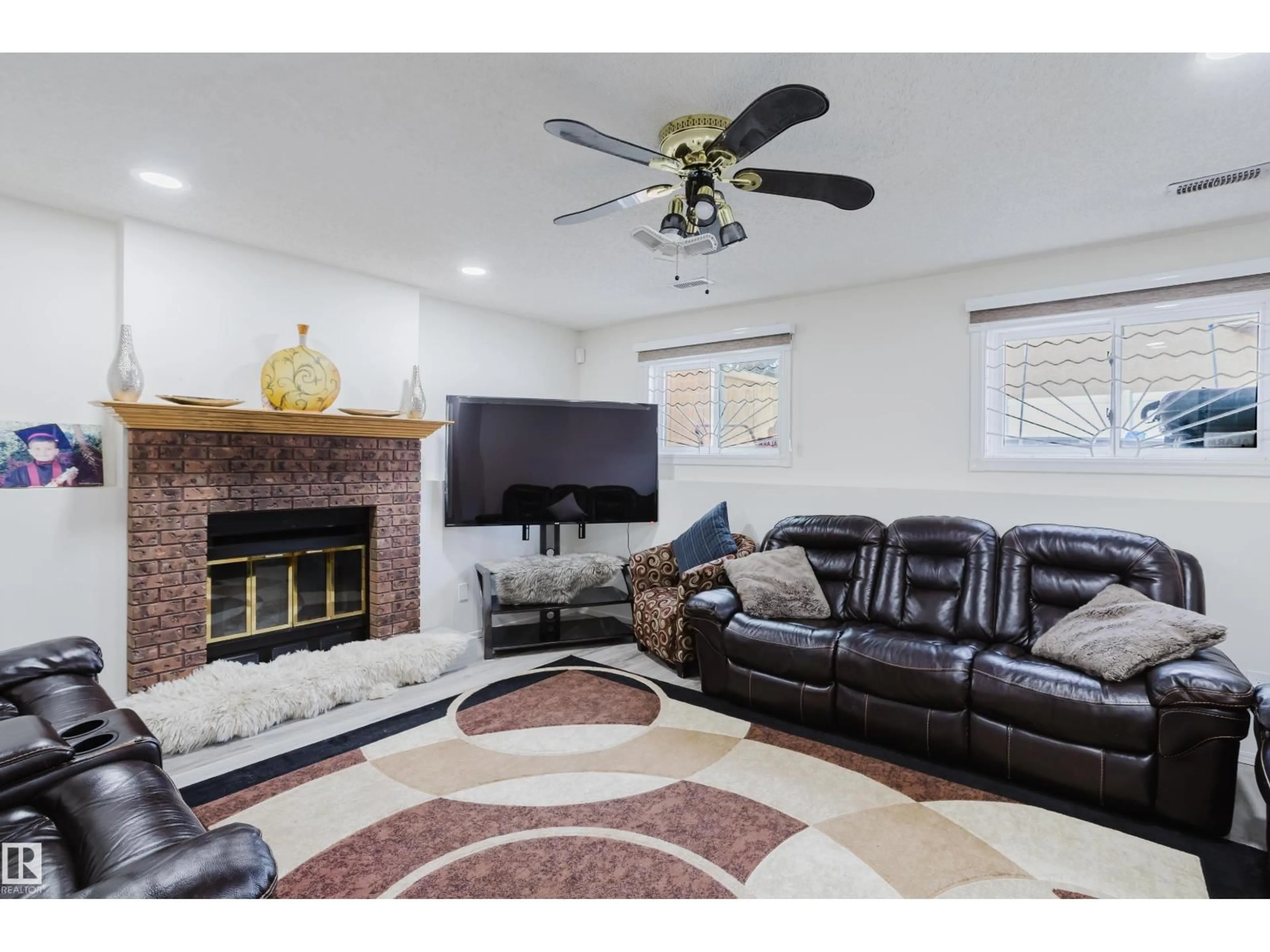 Living room with furniture, ceramic/tile floor for 236 LAGO LINDO CR, Edmonton Alberta T5Z1Y5